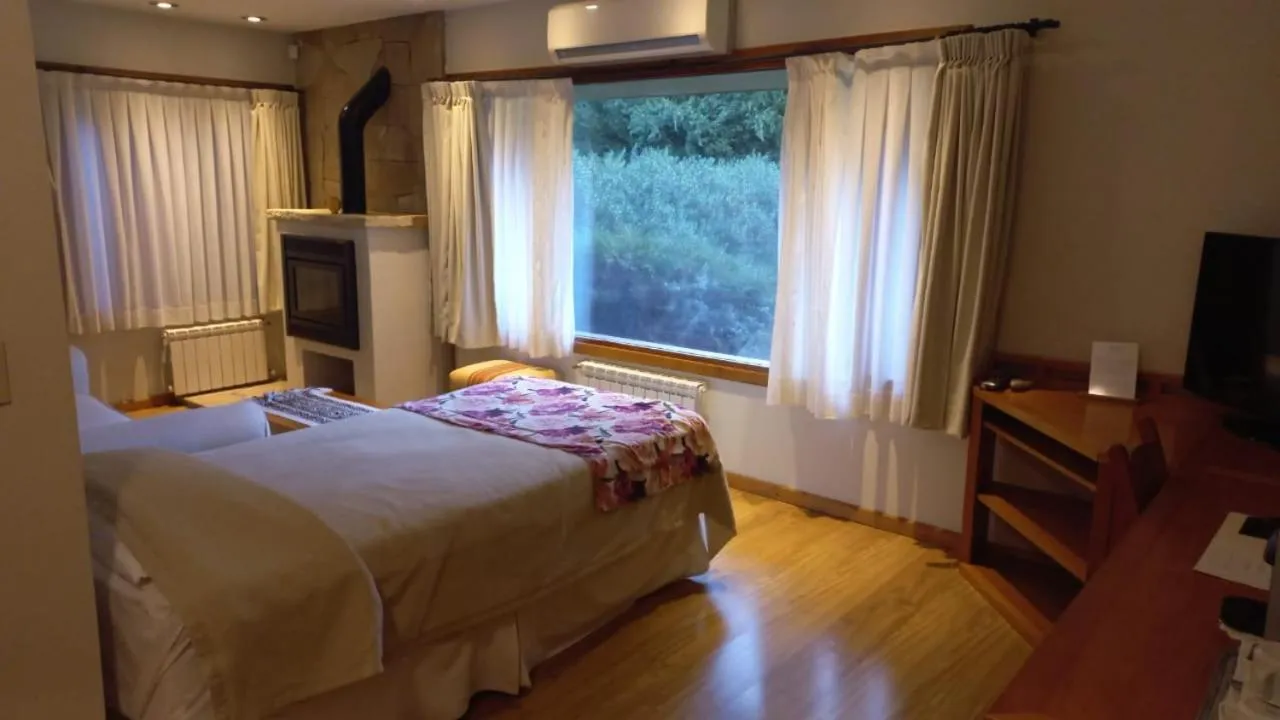 Bed in Hostería Antares Patagonia by Visionnaire