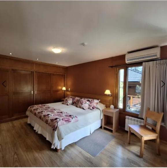 Bed in Hostería Antares Patagonia by Visionnaire