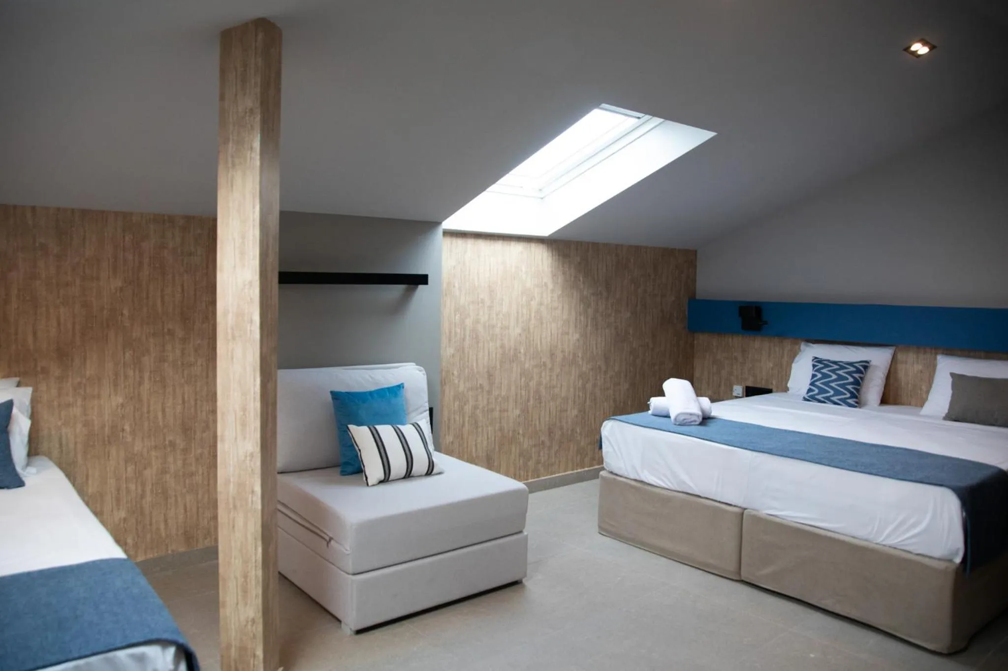 Bed in Mythic Summer Hotel