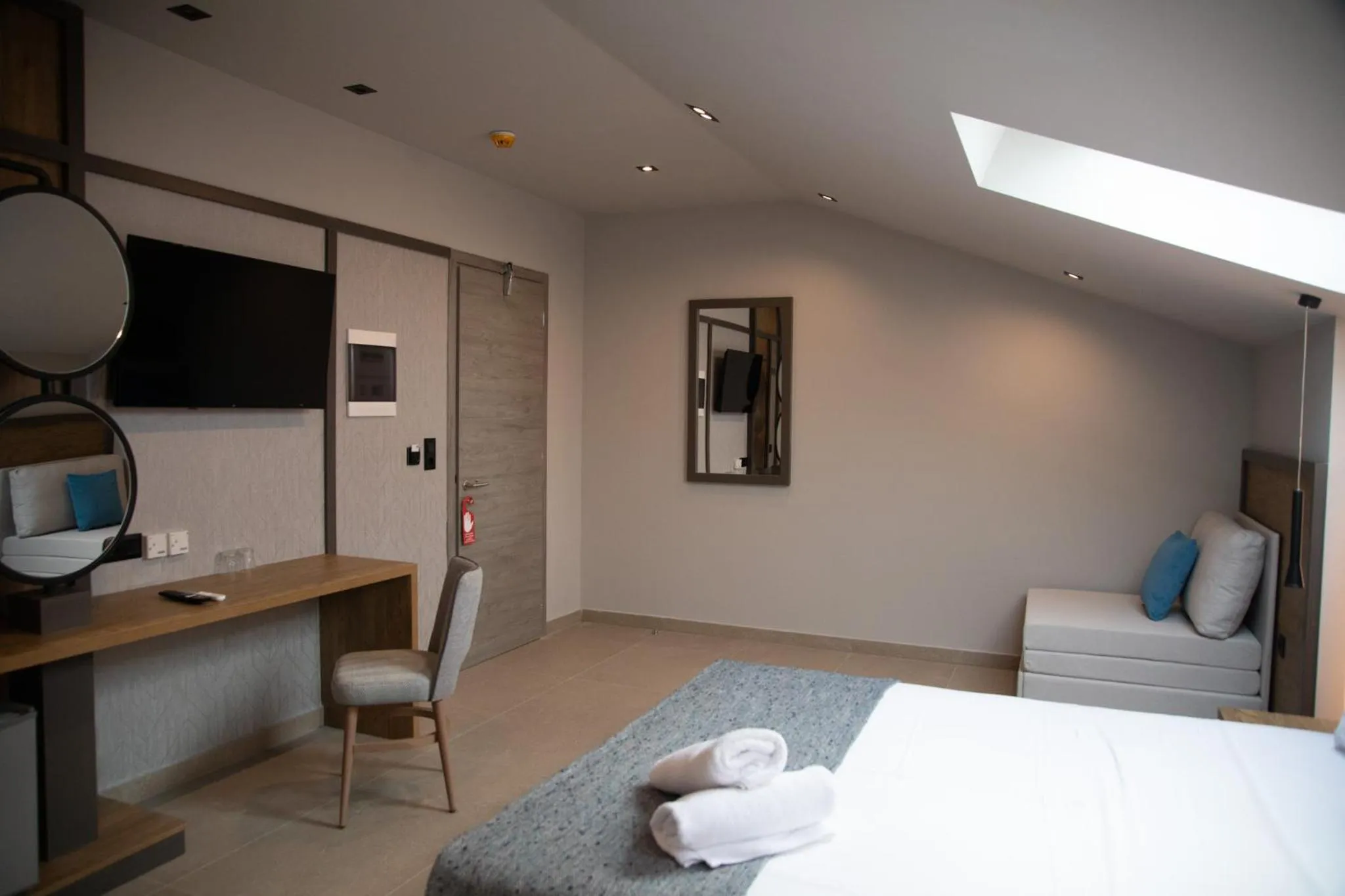 Bed in Mythic Summer Hotel