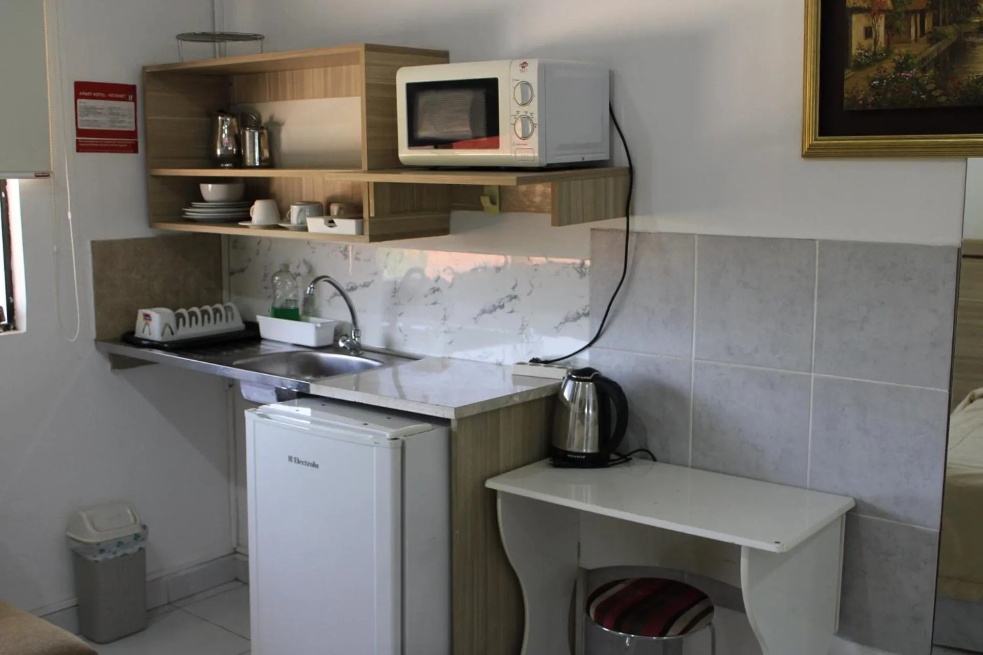 Kitchen or kitchenette in Aparthotel Maison Suisse