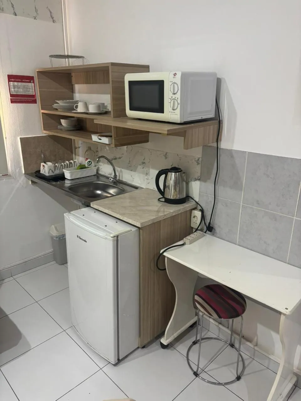 Kitchen or kitchenette in Aparthotel Maison Suisse