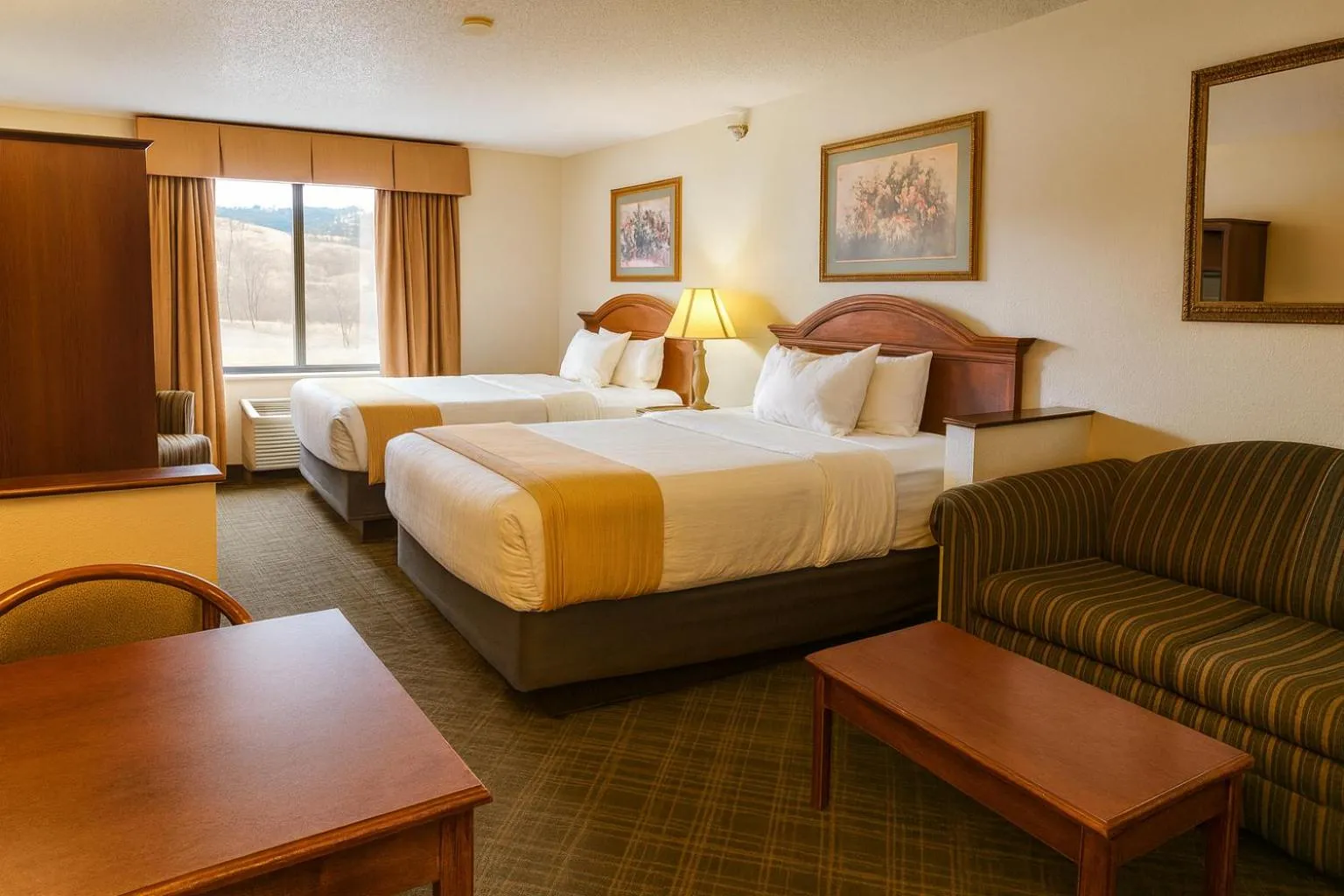 Bed in Stay USA Hotel and Suites