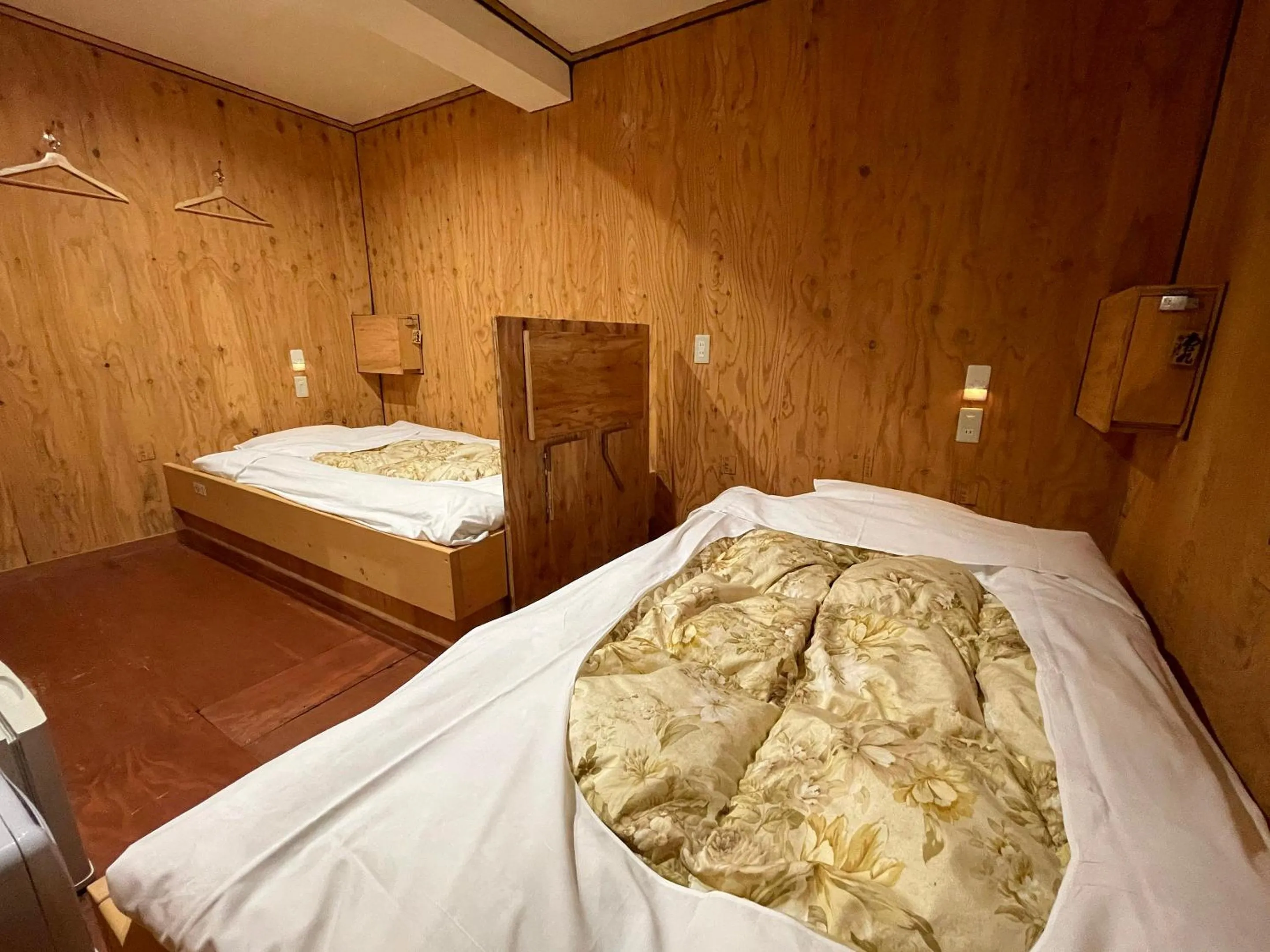 Bedroom, Bed in Guesthouse Otaru Wanokaze