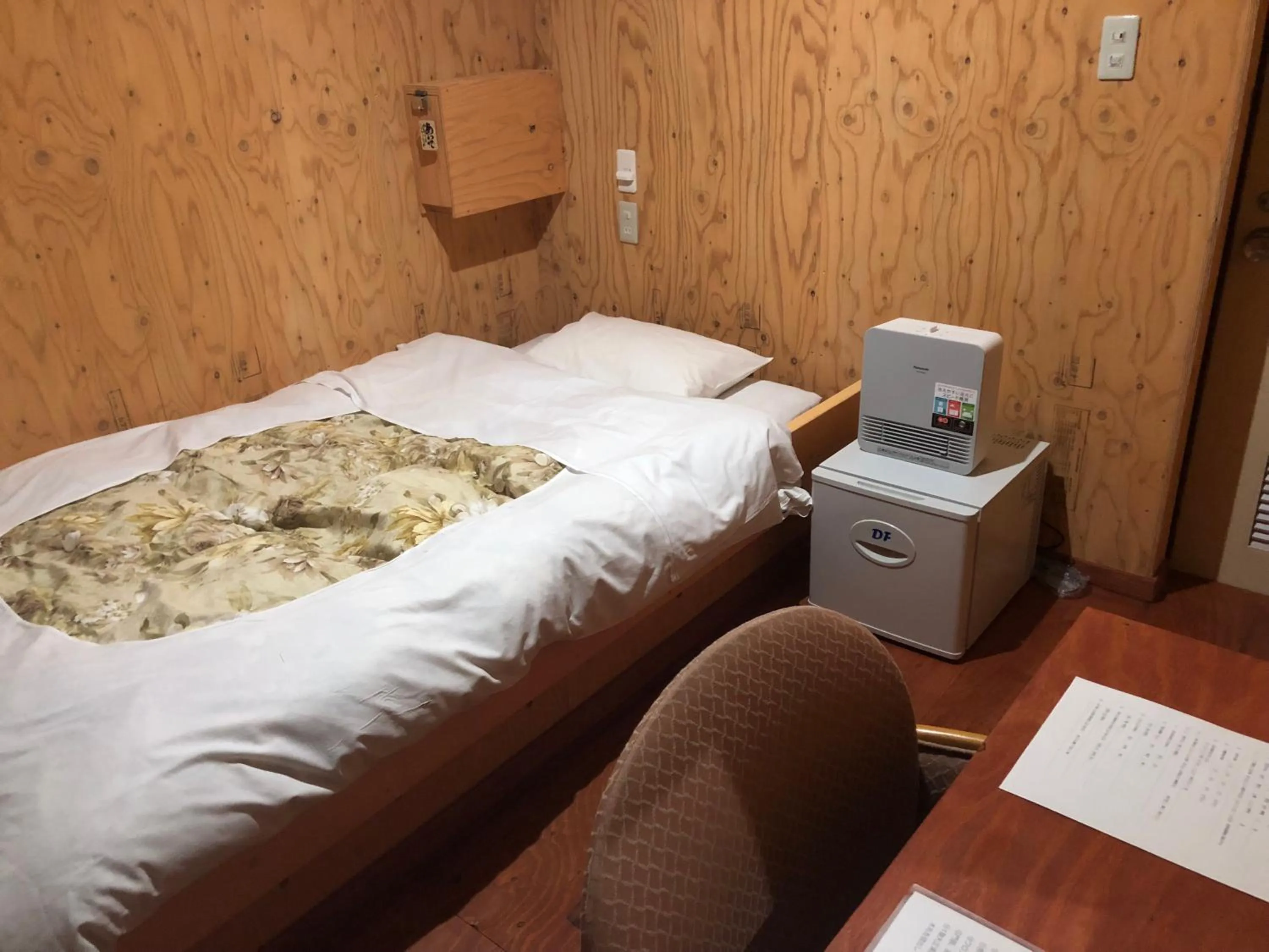 Bed in Guesthouse Otaru Wanokaze