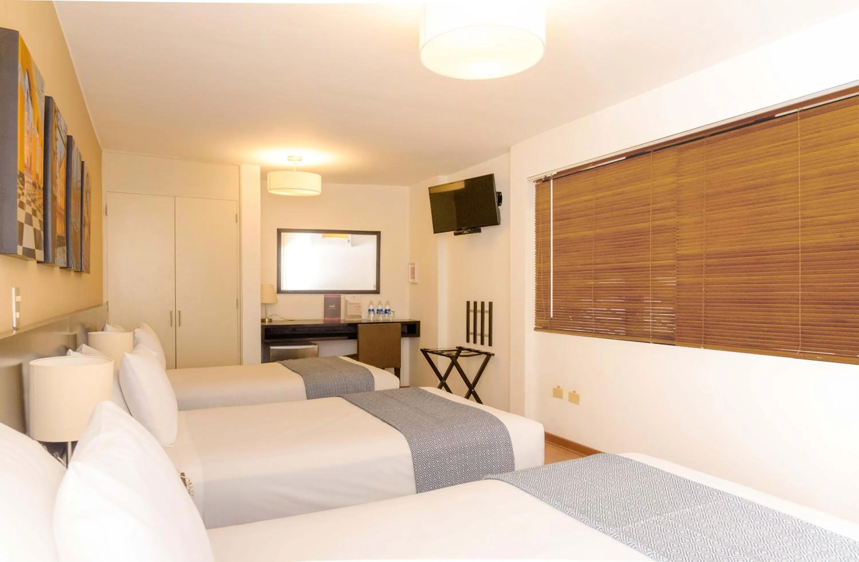 Bed in Girasoles Hotel