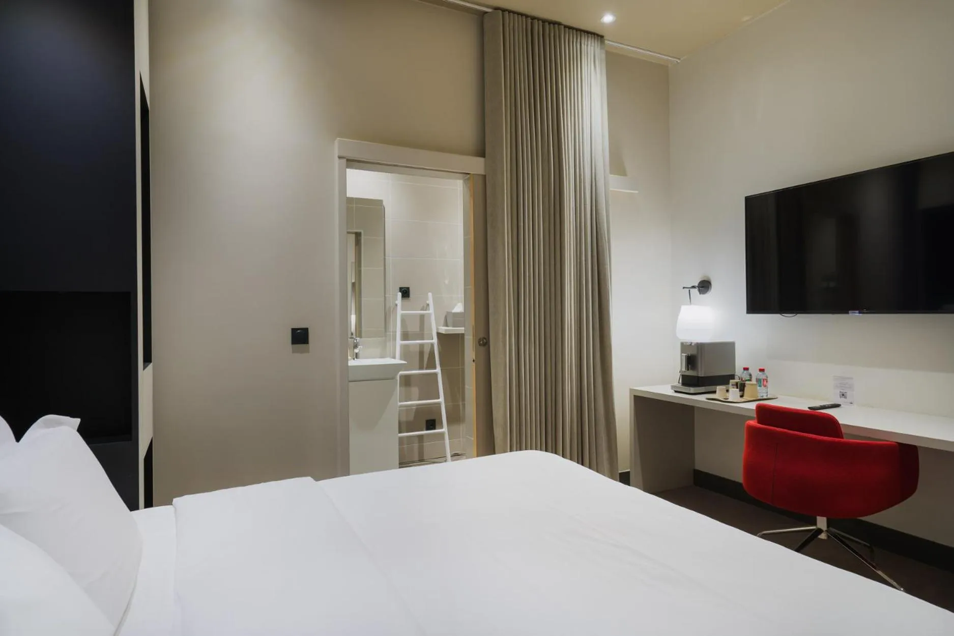 Bed in Maison Nô - Hôtel et Rooftop