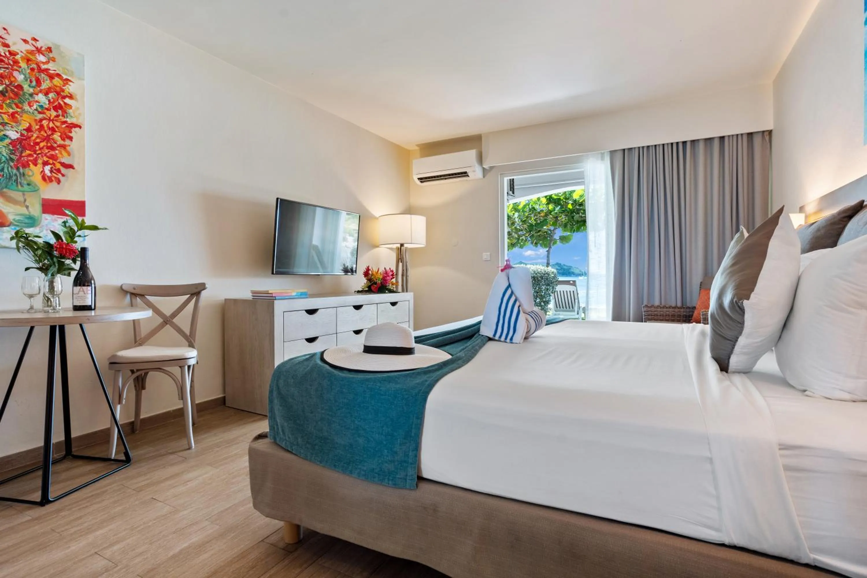 Seating area, Bed in Grand Case Beach Club