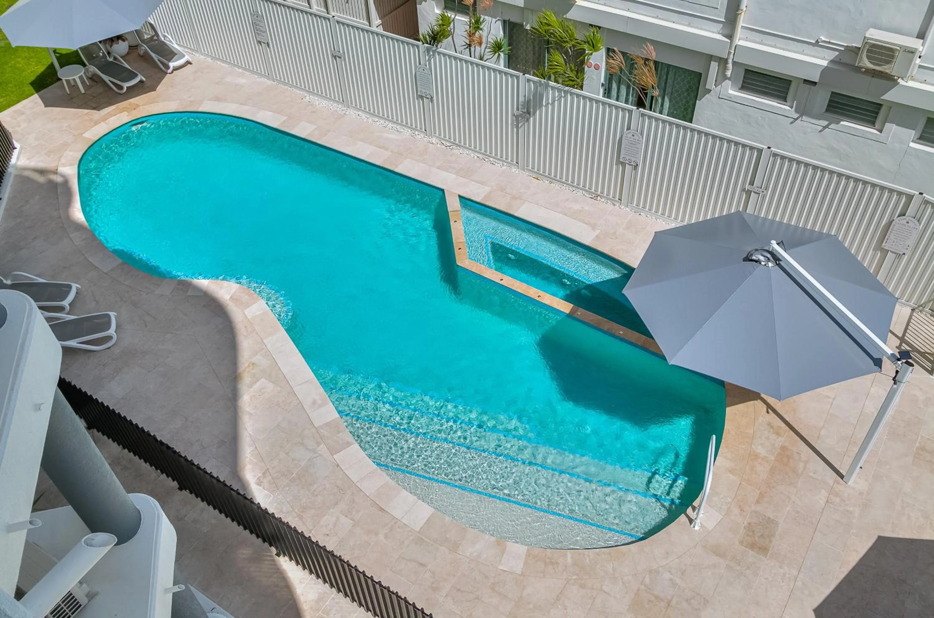 Pool view in Oceanside Resort - Absolute Beachfront Apartments