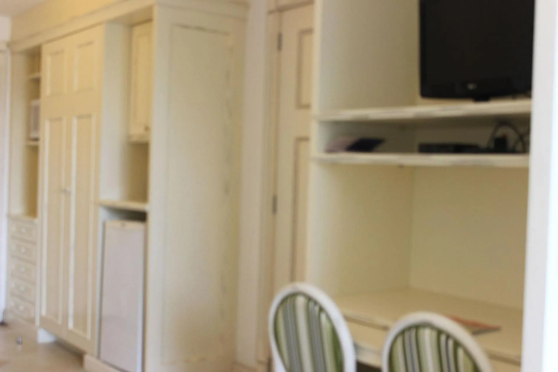 Kitchen or kitchenette, TV/Entertainment Center in IL Campanario é Destino Floripa