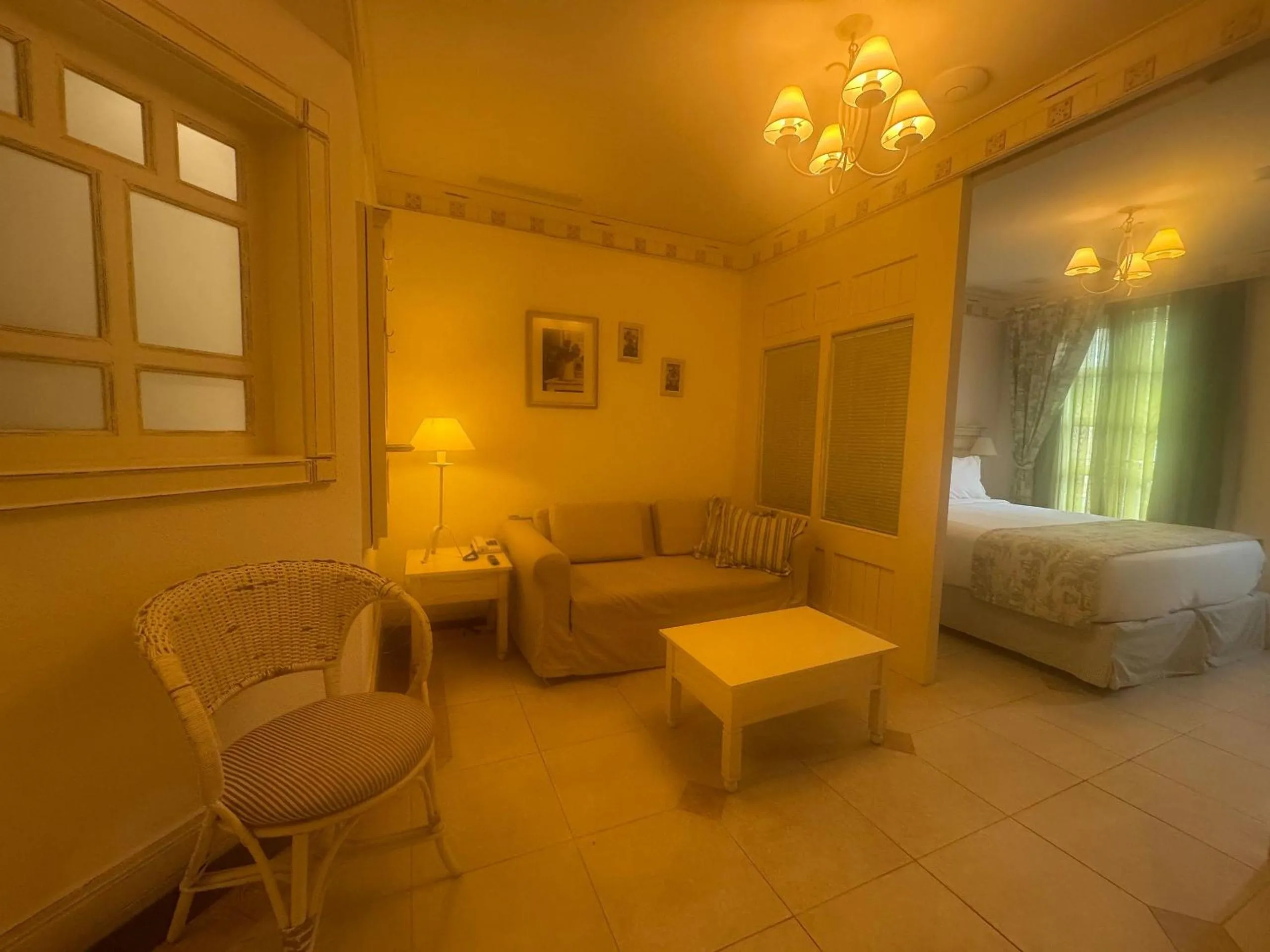 Seating area, Bed in Destino Floripa Jurerê In