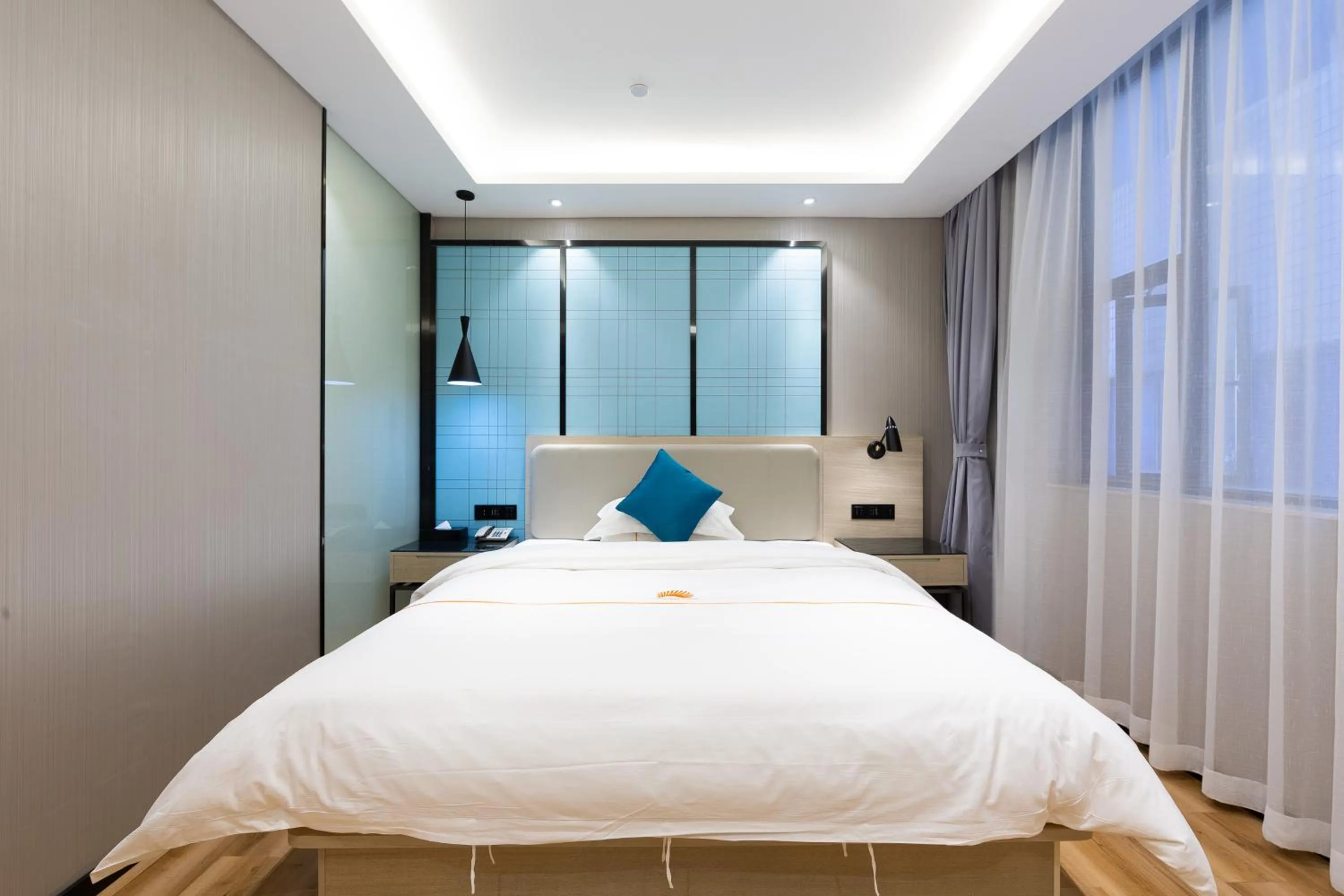 Bed in 朗逸商务酒店 Warm Yes Hotel-广交会期间提供免费穿梭巴士
