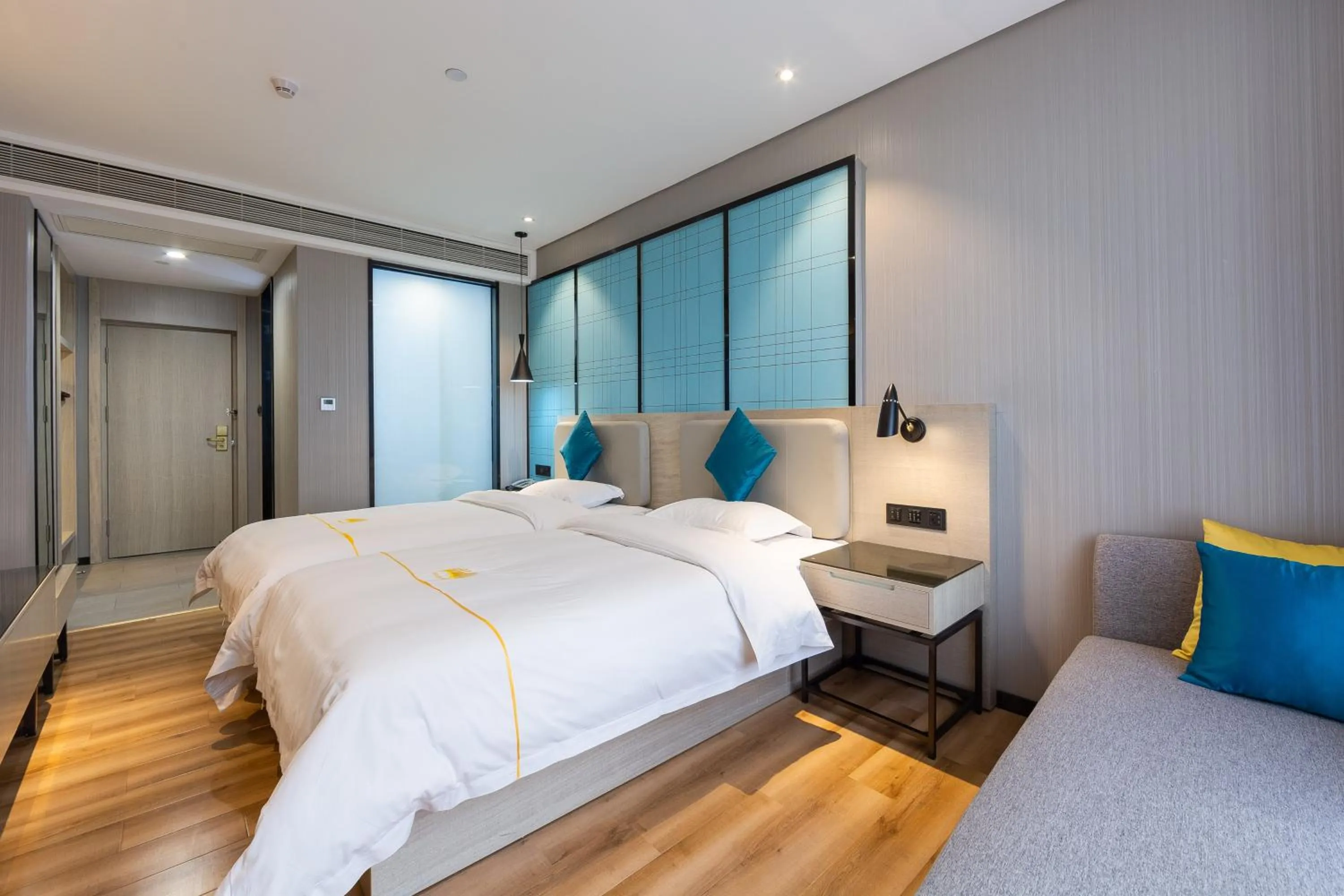 Bed in 朗逸商务酒店 Warm Yes Hotel-广交会期间提供免费穿梭巴士