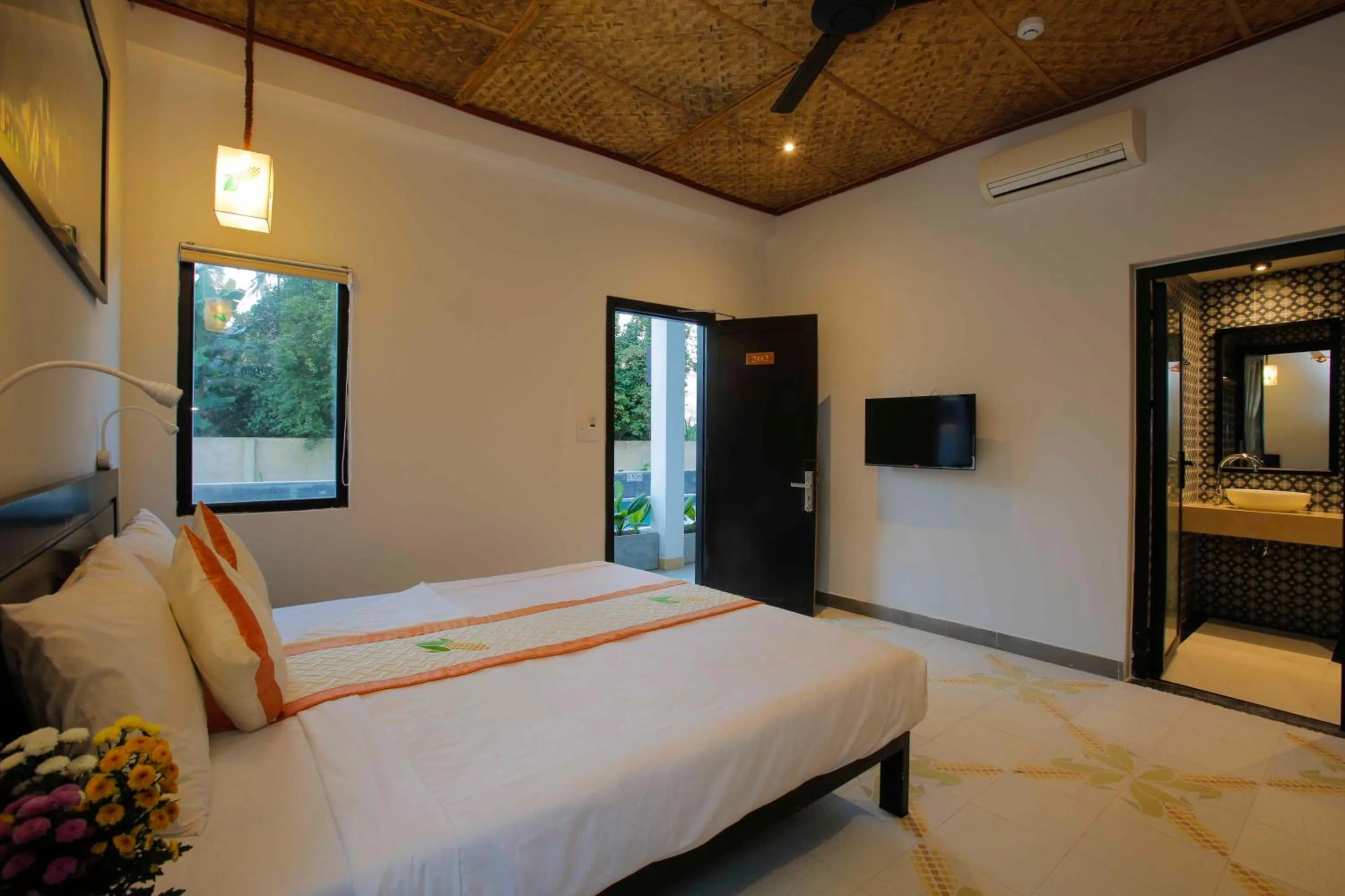 Bed in Hoi An Corn Riverside Villa