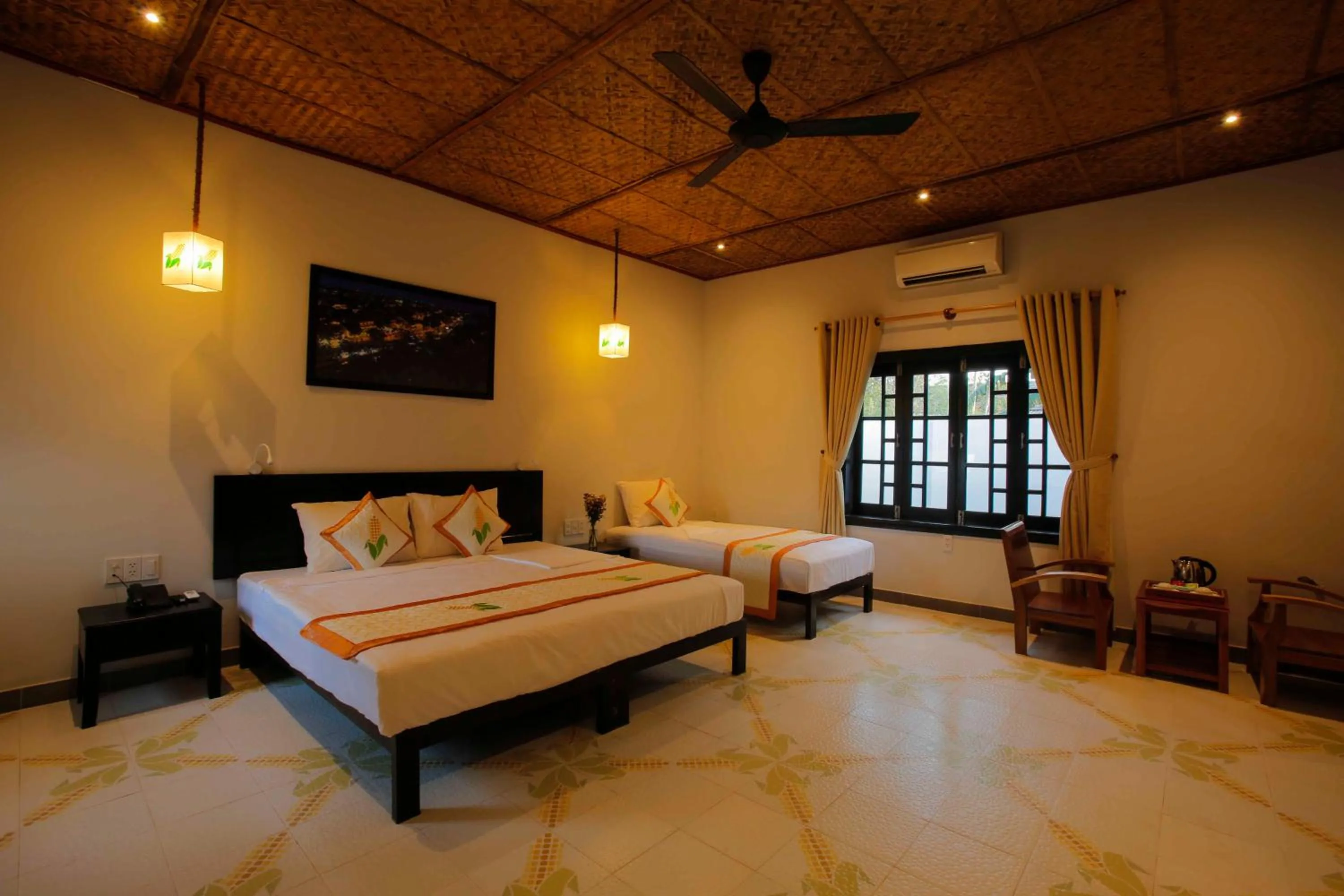 Bed in Hoi An Corn Riverside Villa