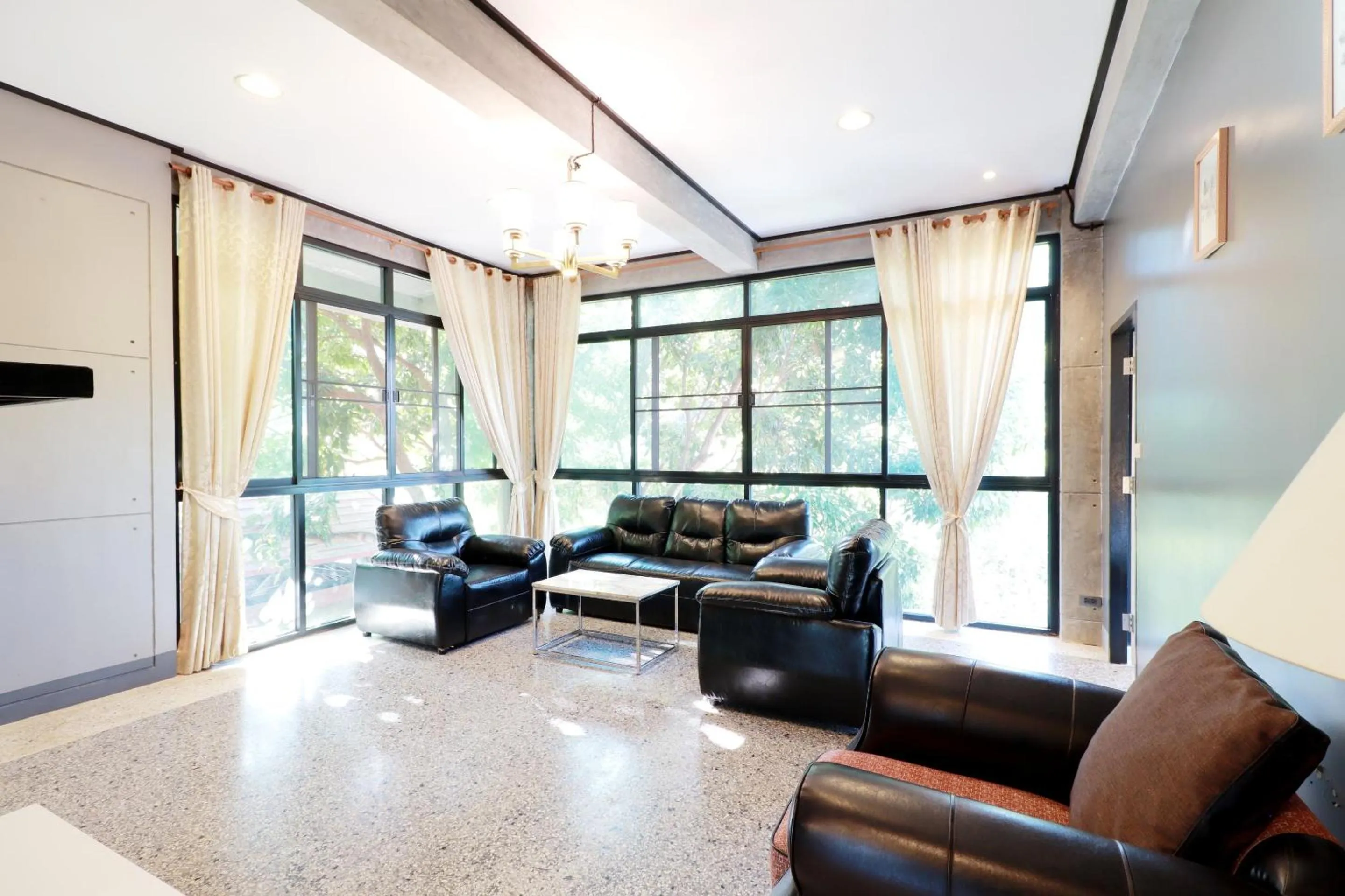 Living room in Capital O 464 At Nata Chiangmai Chic Jungle