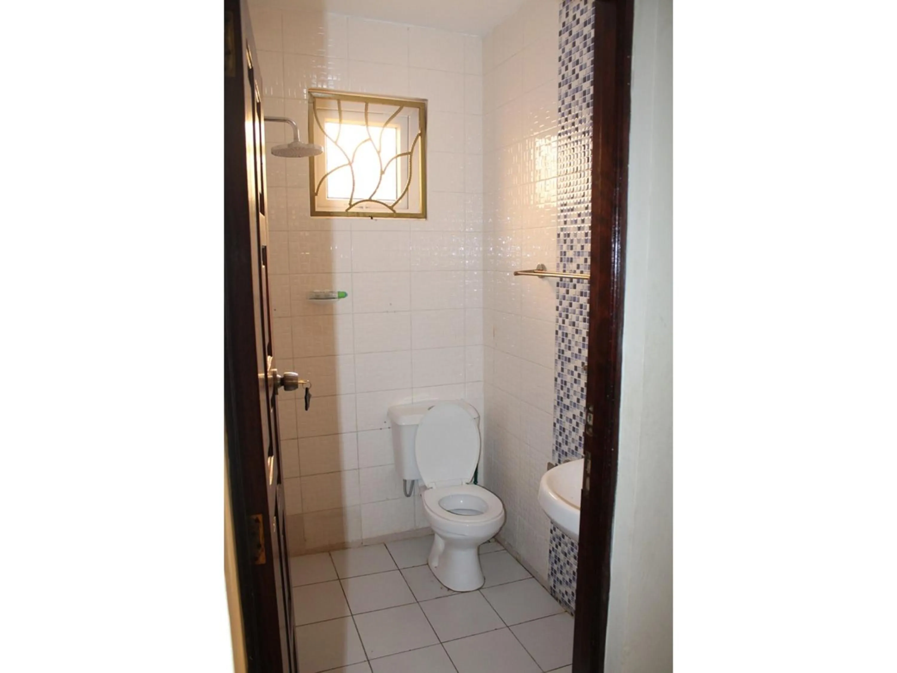 Shower in Oluwa Seun Beach Cottages, Mtwapa