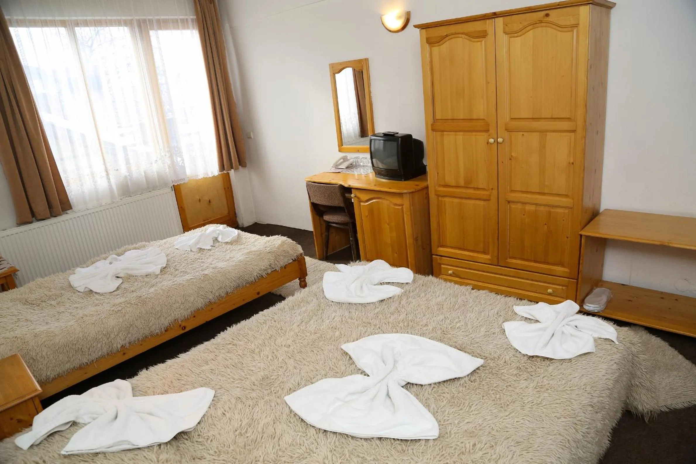 Bed in Family Hotel Bisser