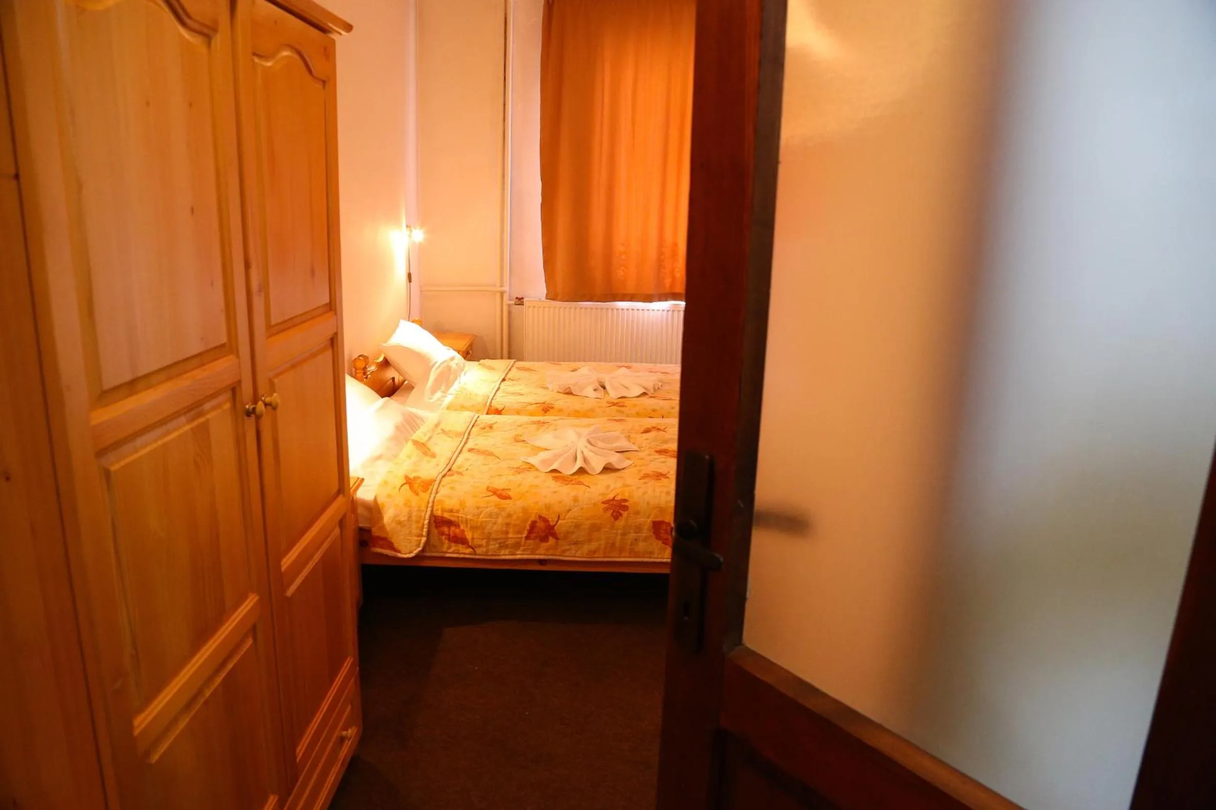 Bed in Family Hotel Bisser