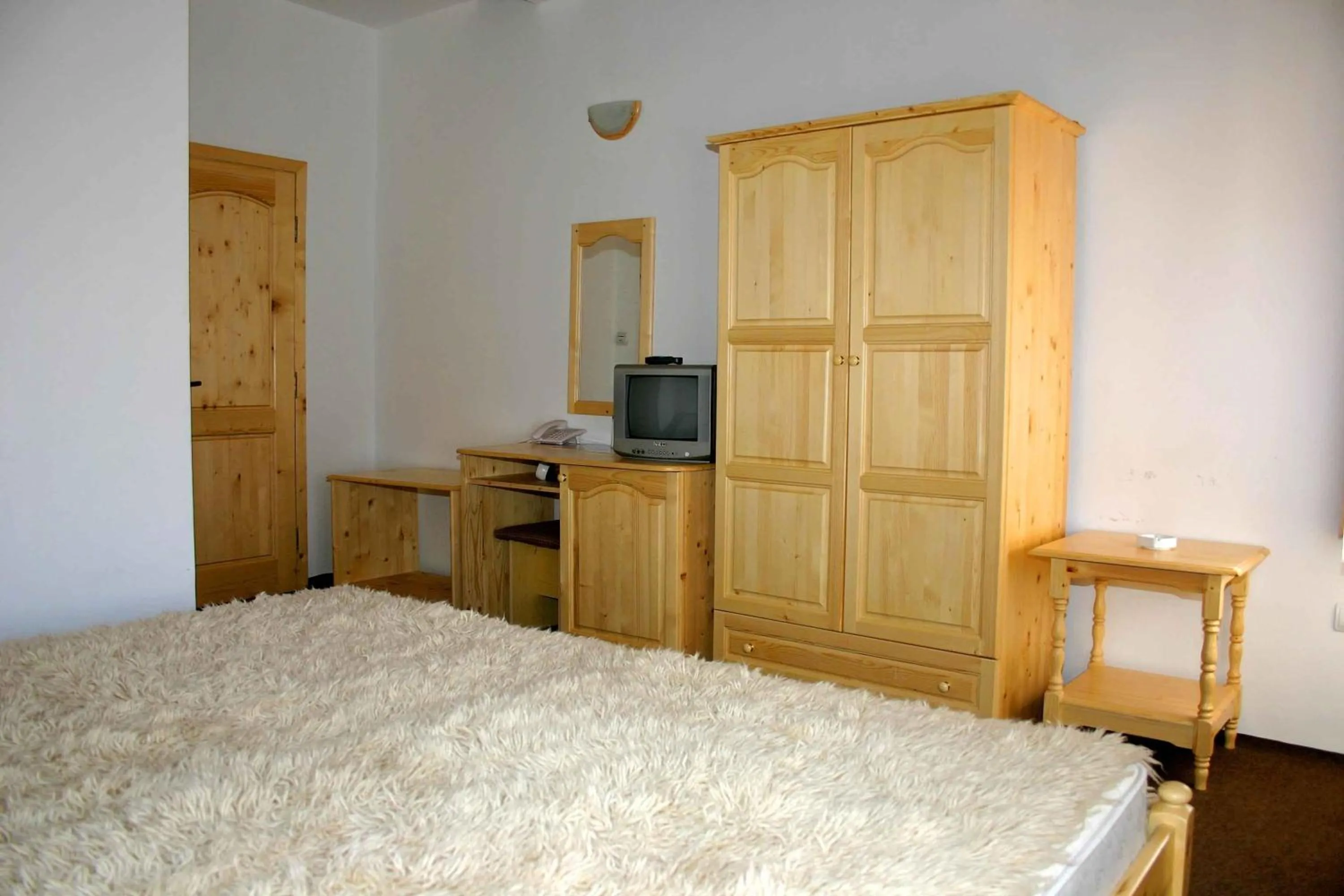 Bed in Family Hotel Bisser