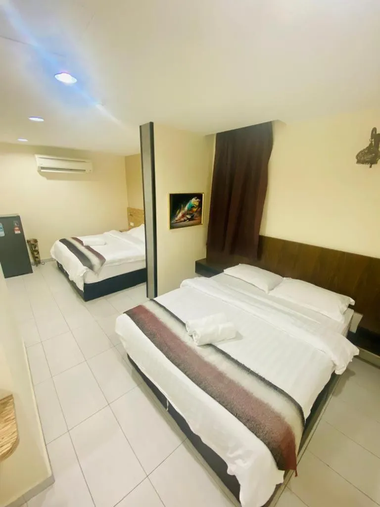 Bed in BG Business Hotel