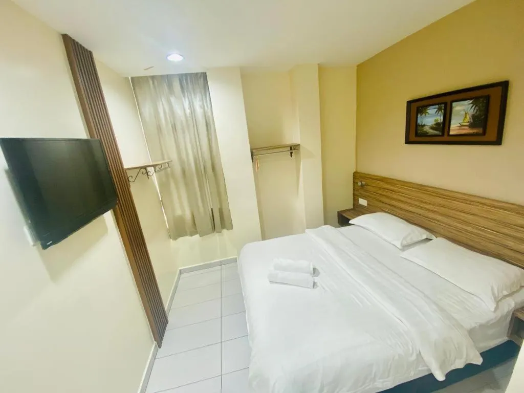 Bed in BG Business Hotel