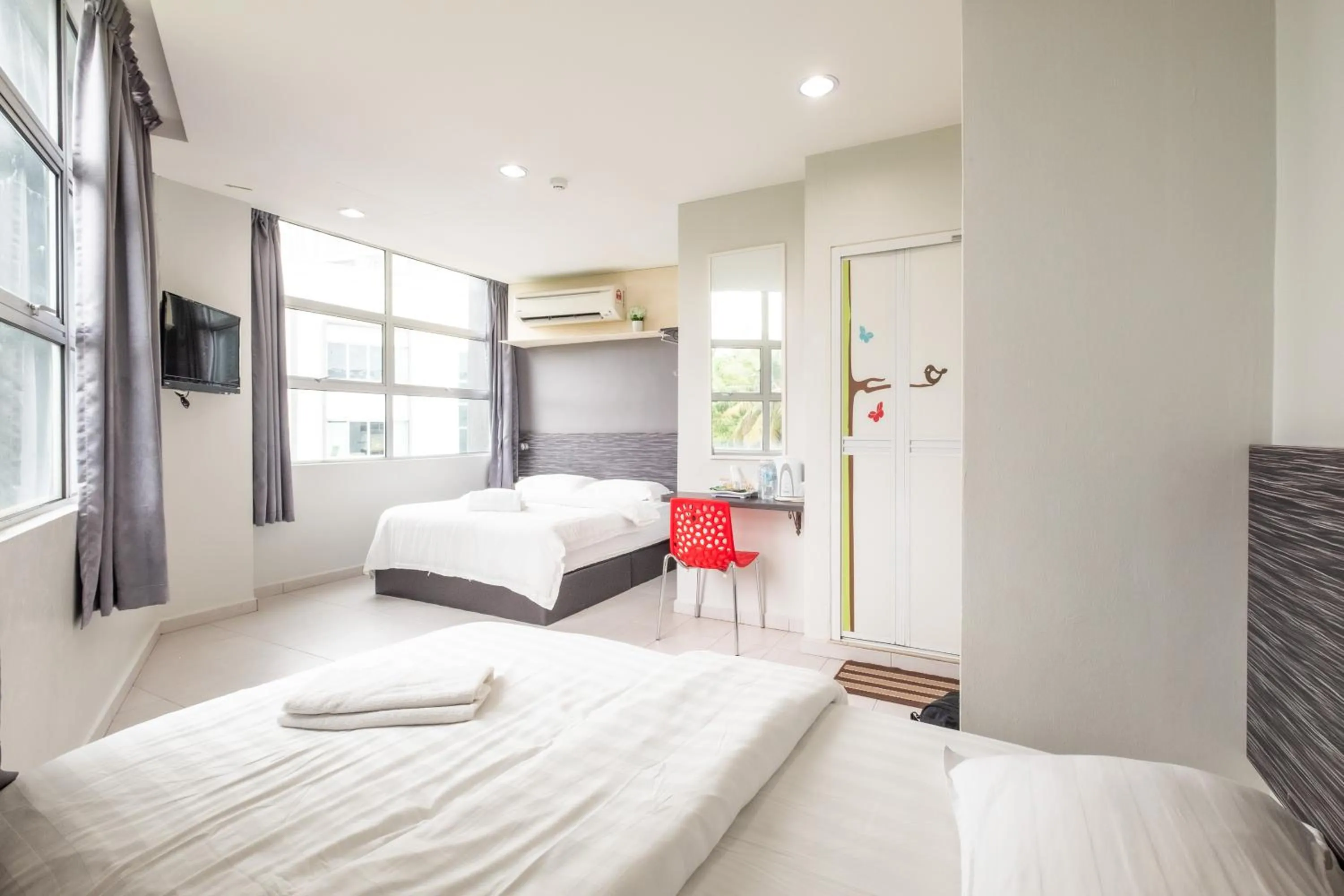 Bed in BG Business Hotel