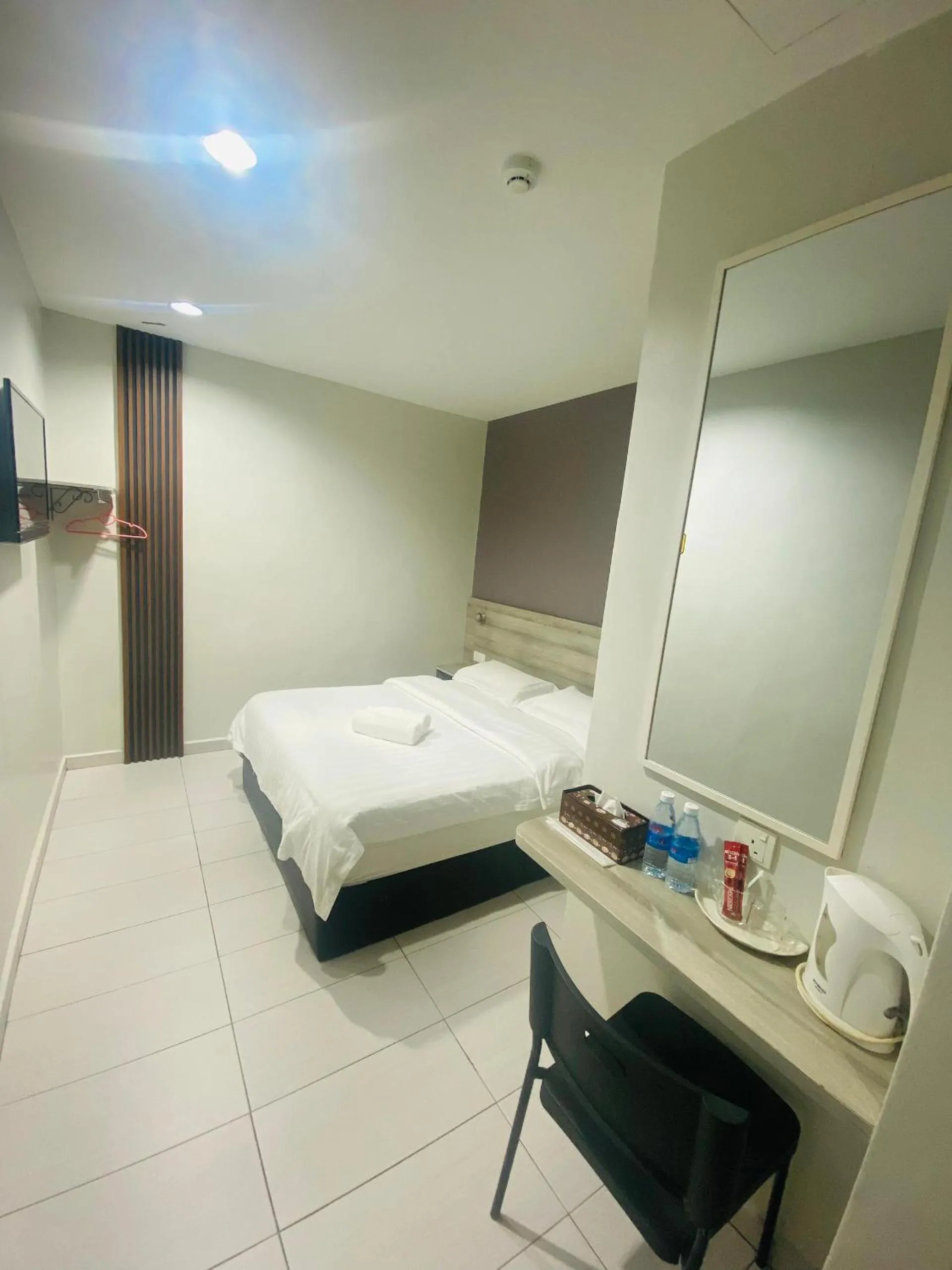 Bed in BG Business Hotel