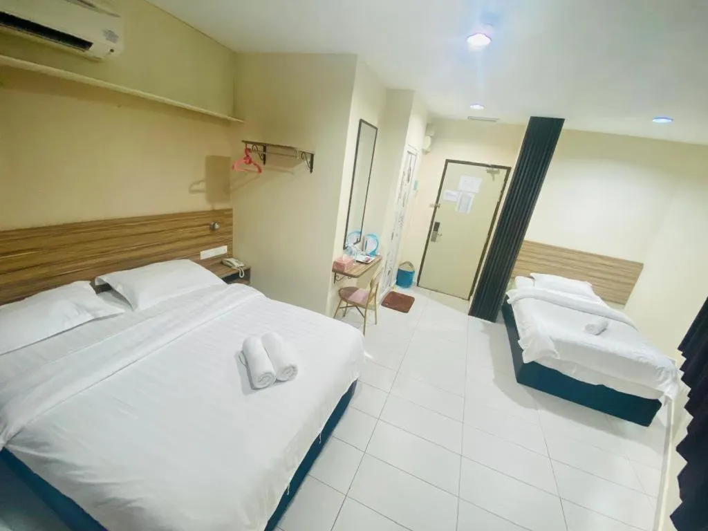 Bed in BG Business Hotel