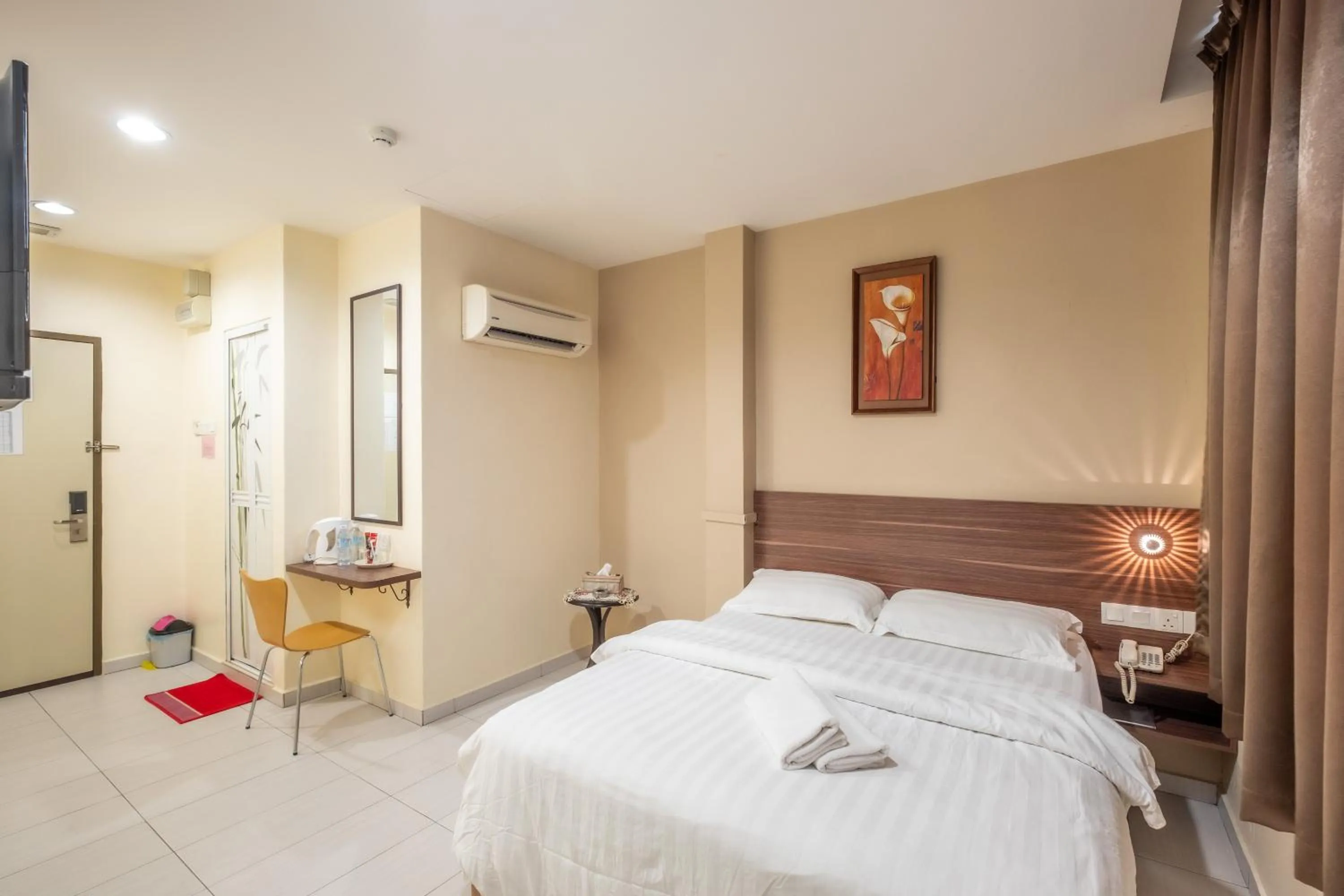 Bed in BG Business Hotel