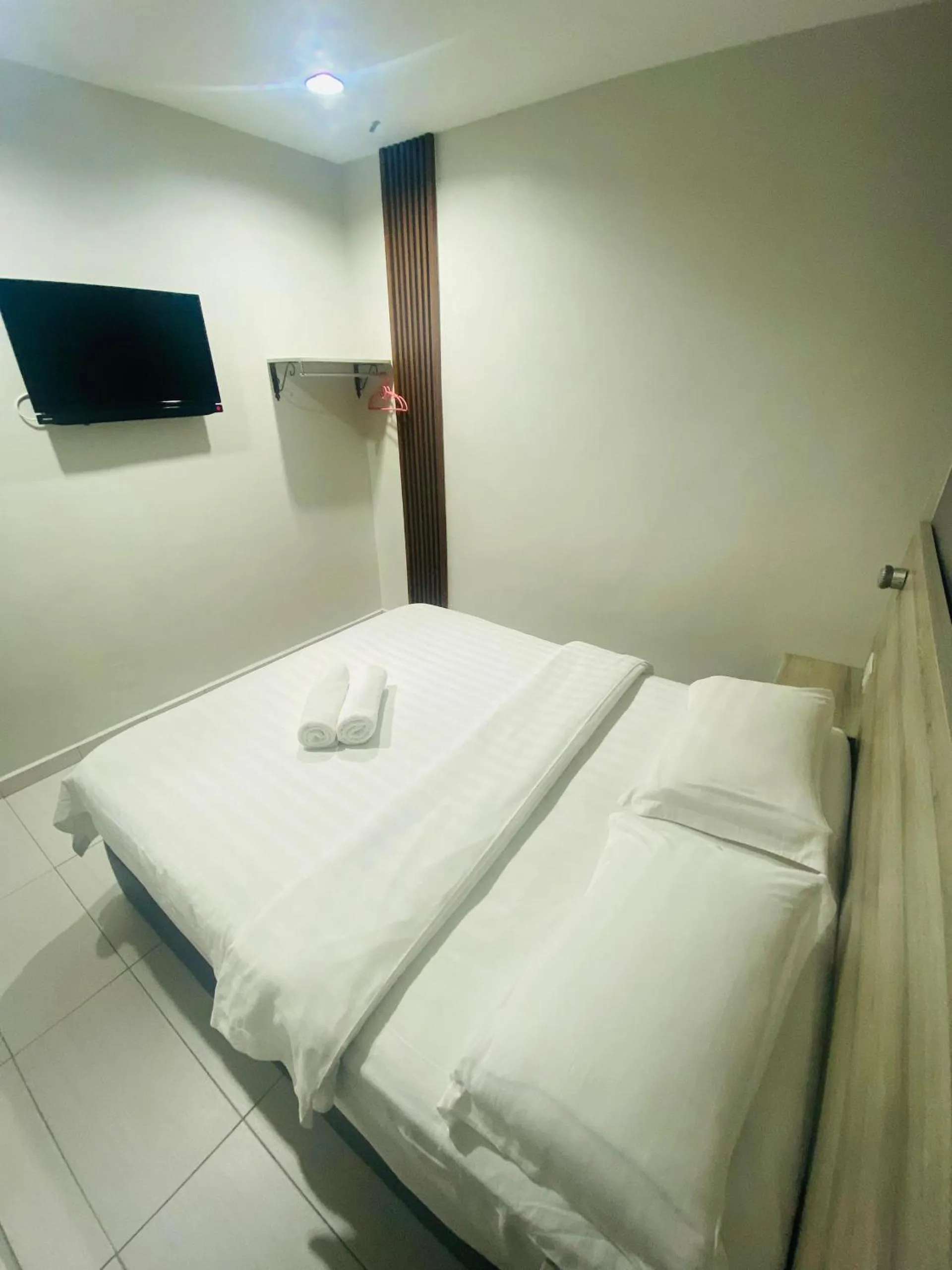 Bed in BG Business Hotel