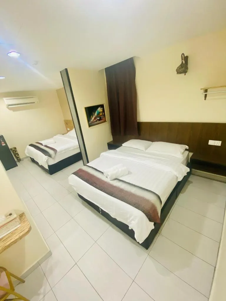 Bed in BG Business Hotel