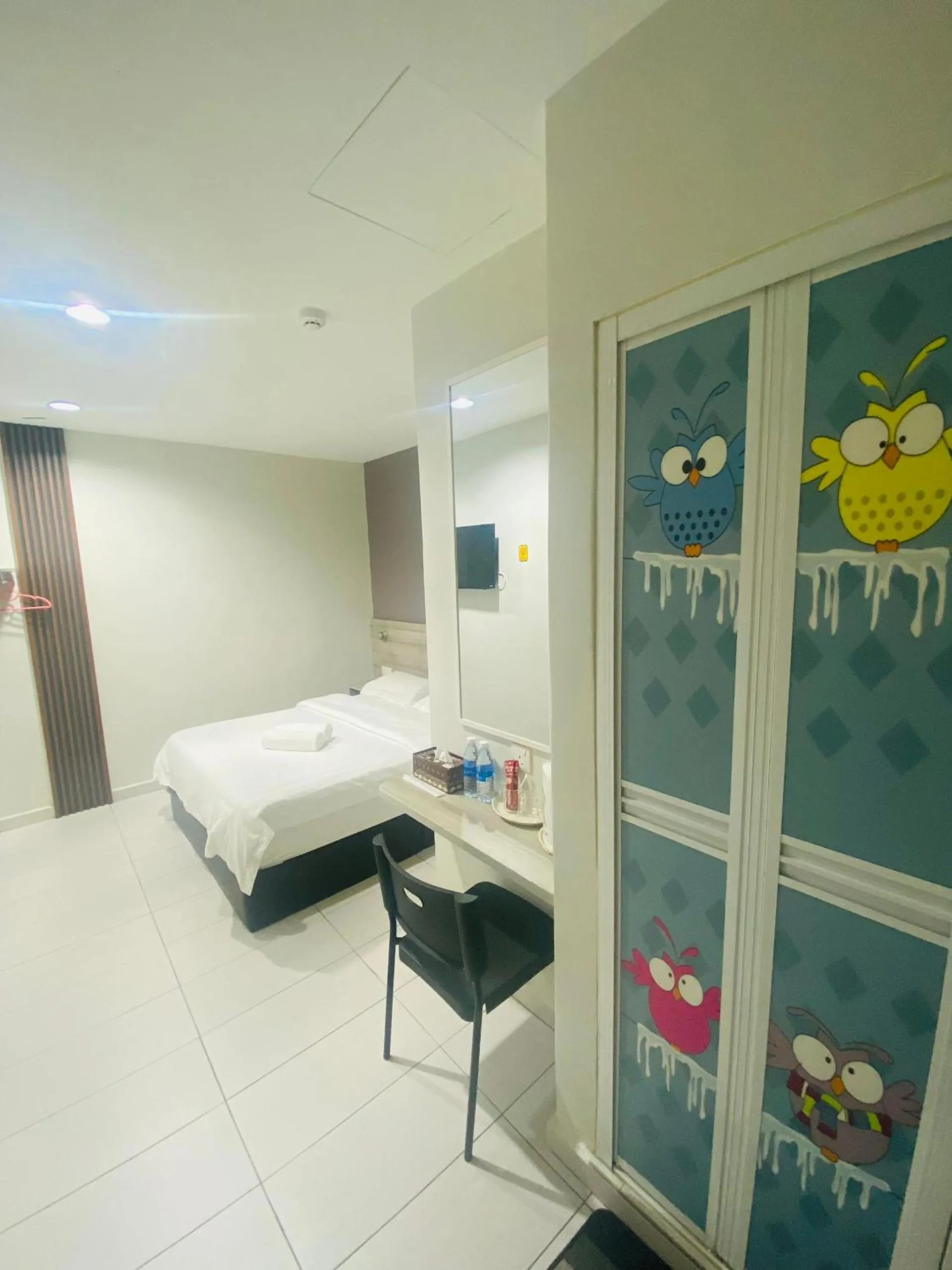 Bed in BG Business Hotel