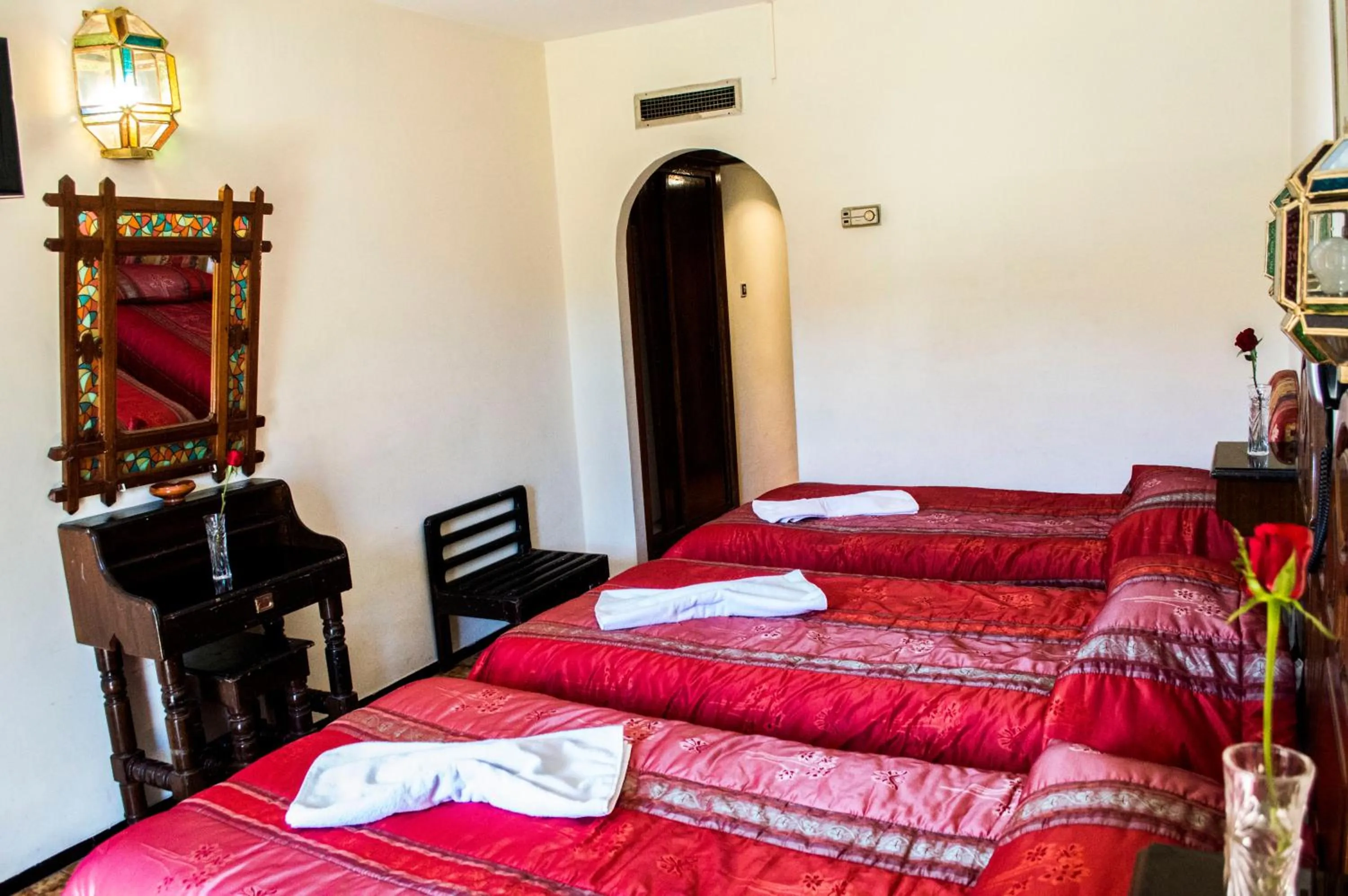 Bed in Hotel Tachfine