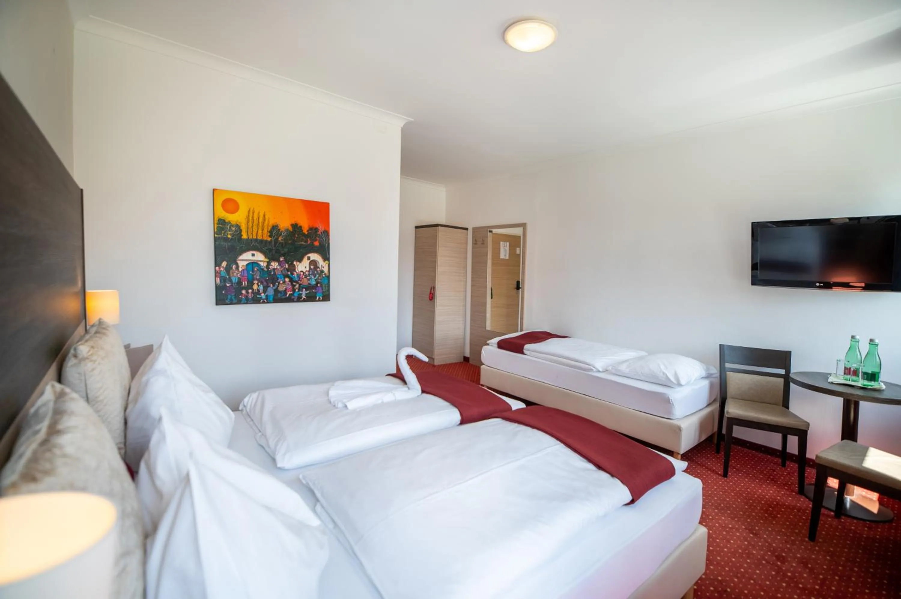 Bed in Hotel Marc Aurel