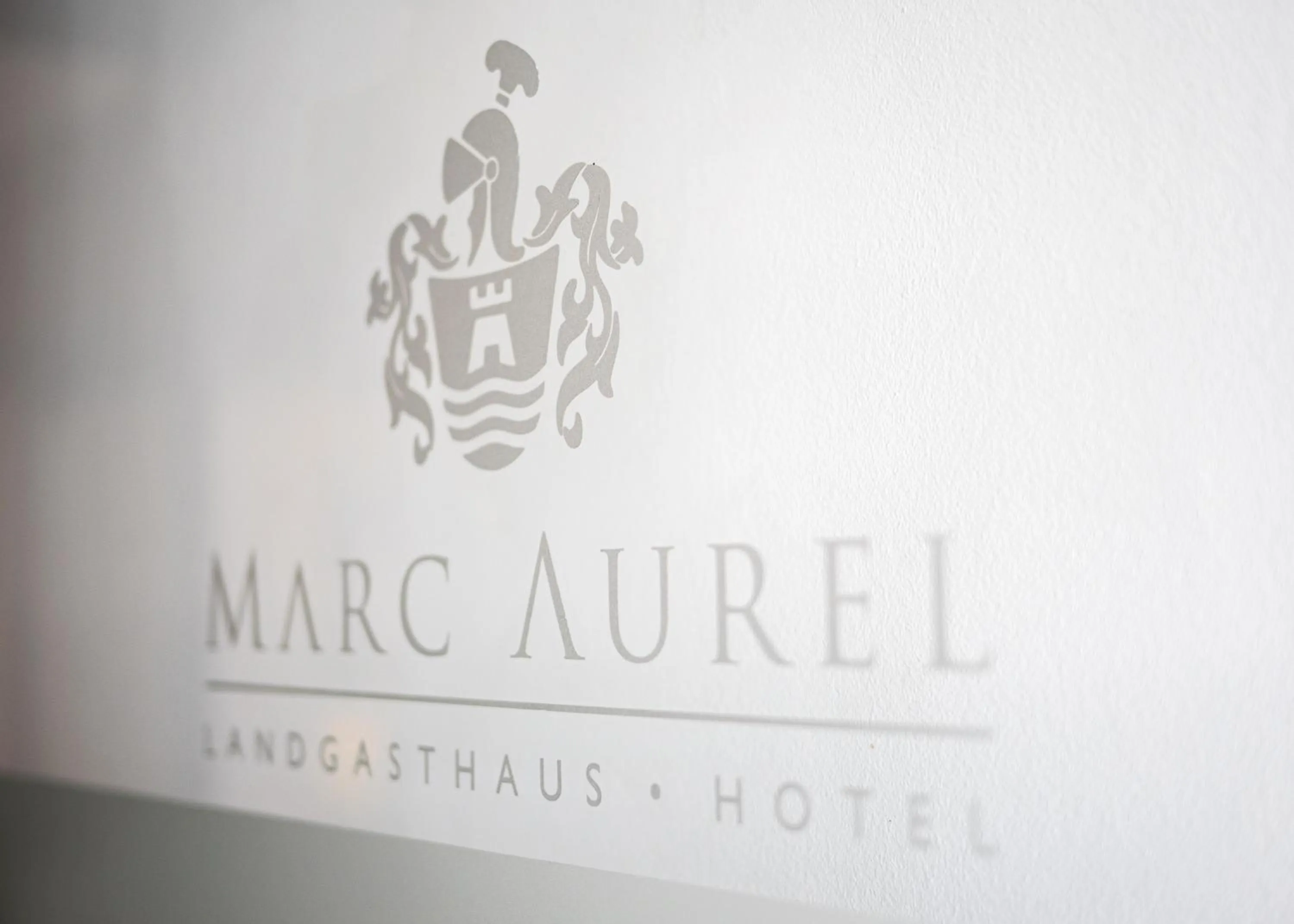 Property logo or sign in Hotel Marc Aurel