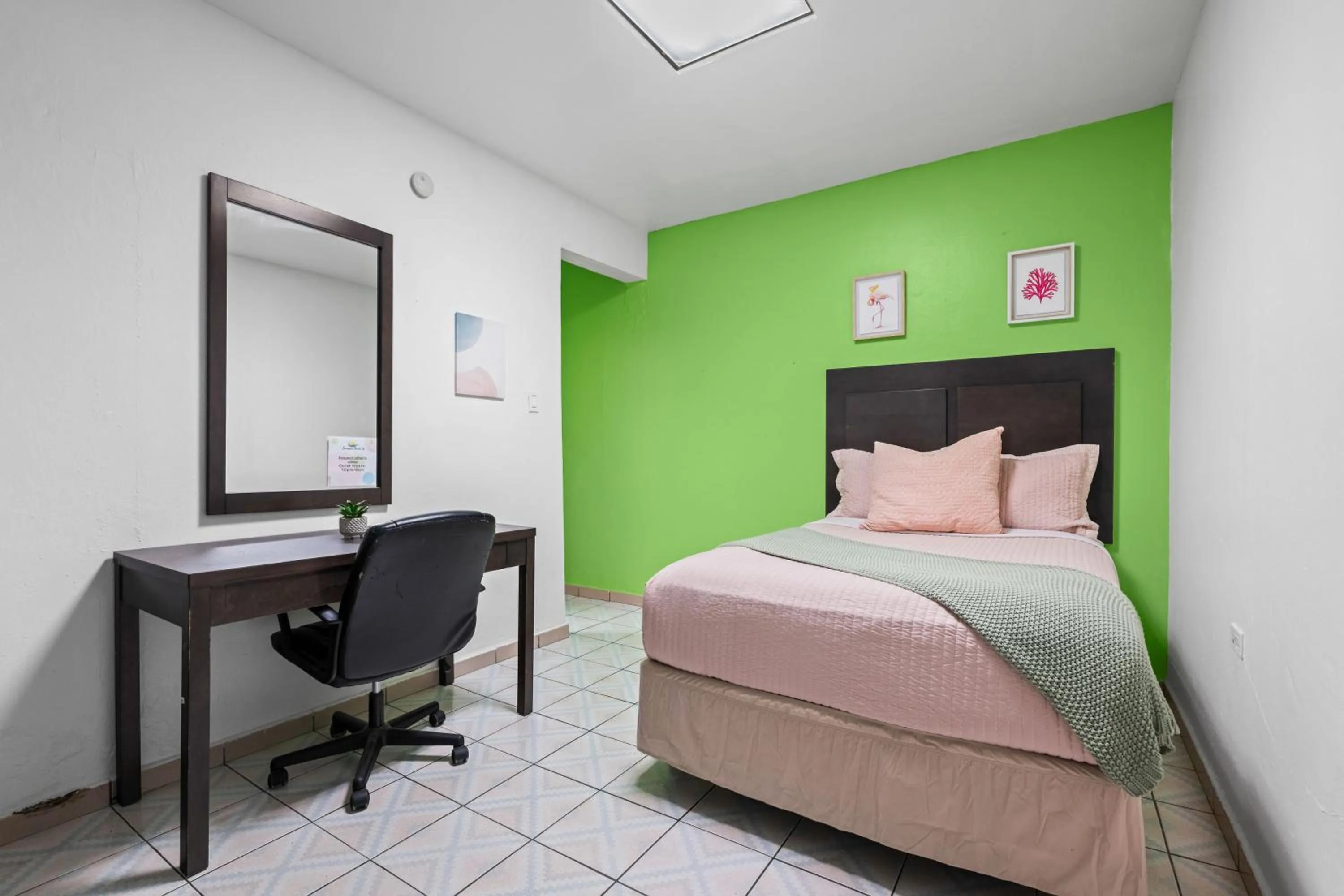 Bed in Borinquen Beach Inn