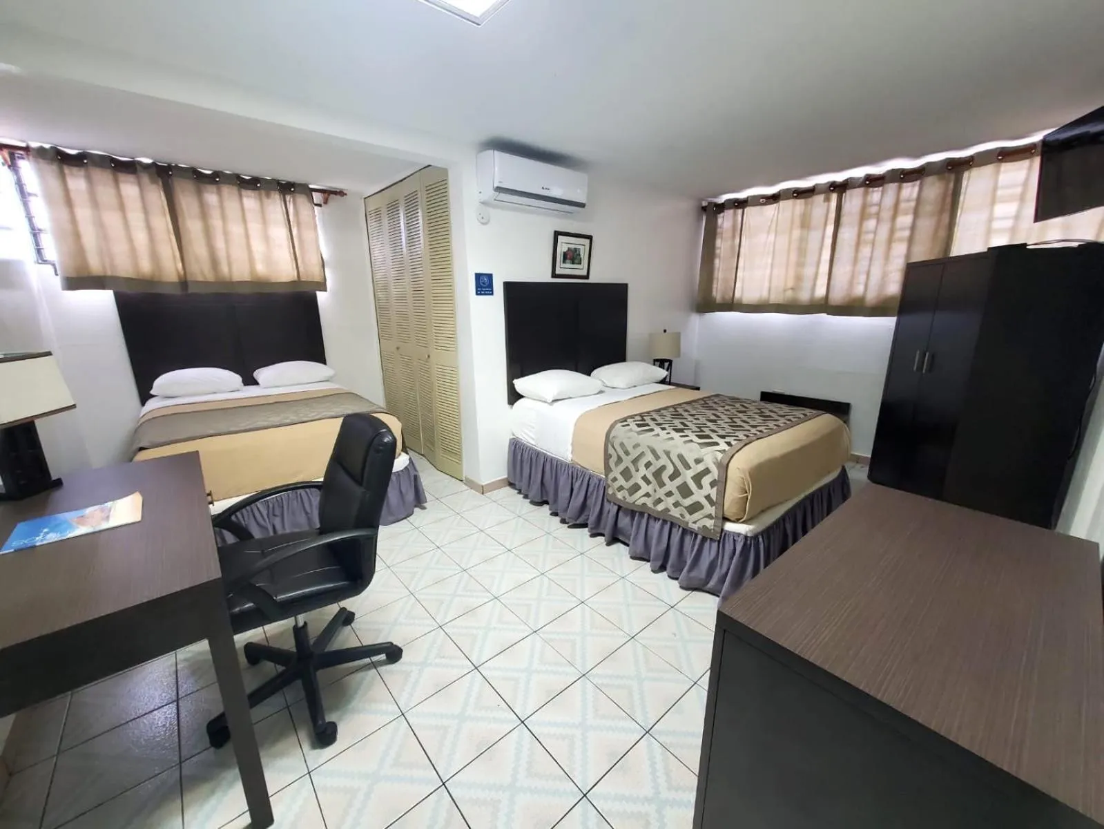 Guest Room with Two Double Beds in Borinquen Beach Inn