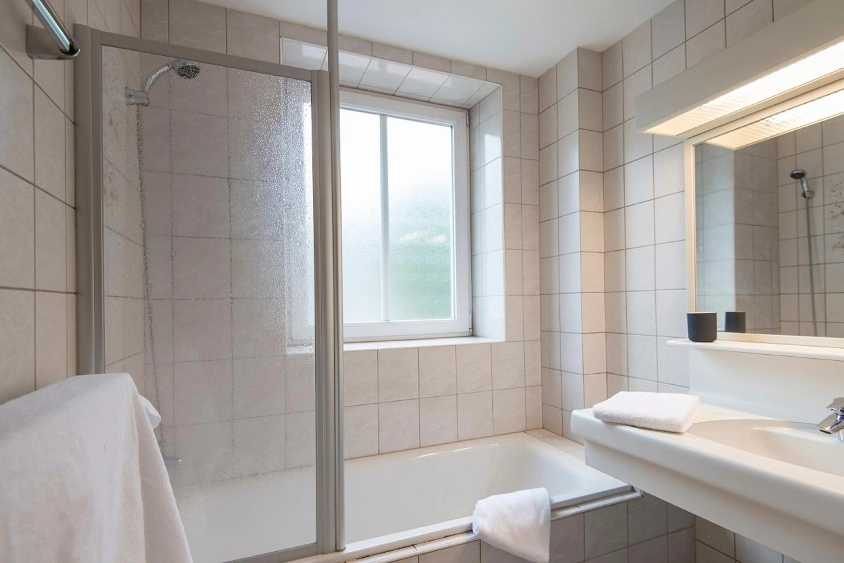 Bathroom in Residenz Lothringen by AlpenTravel