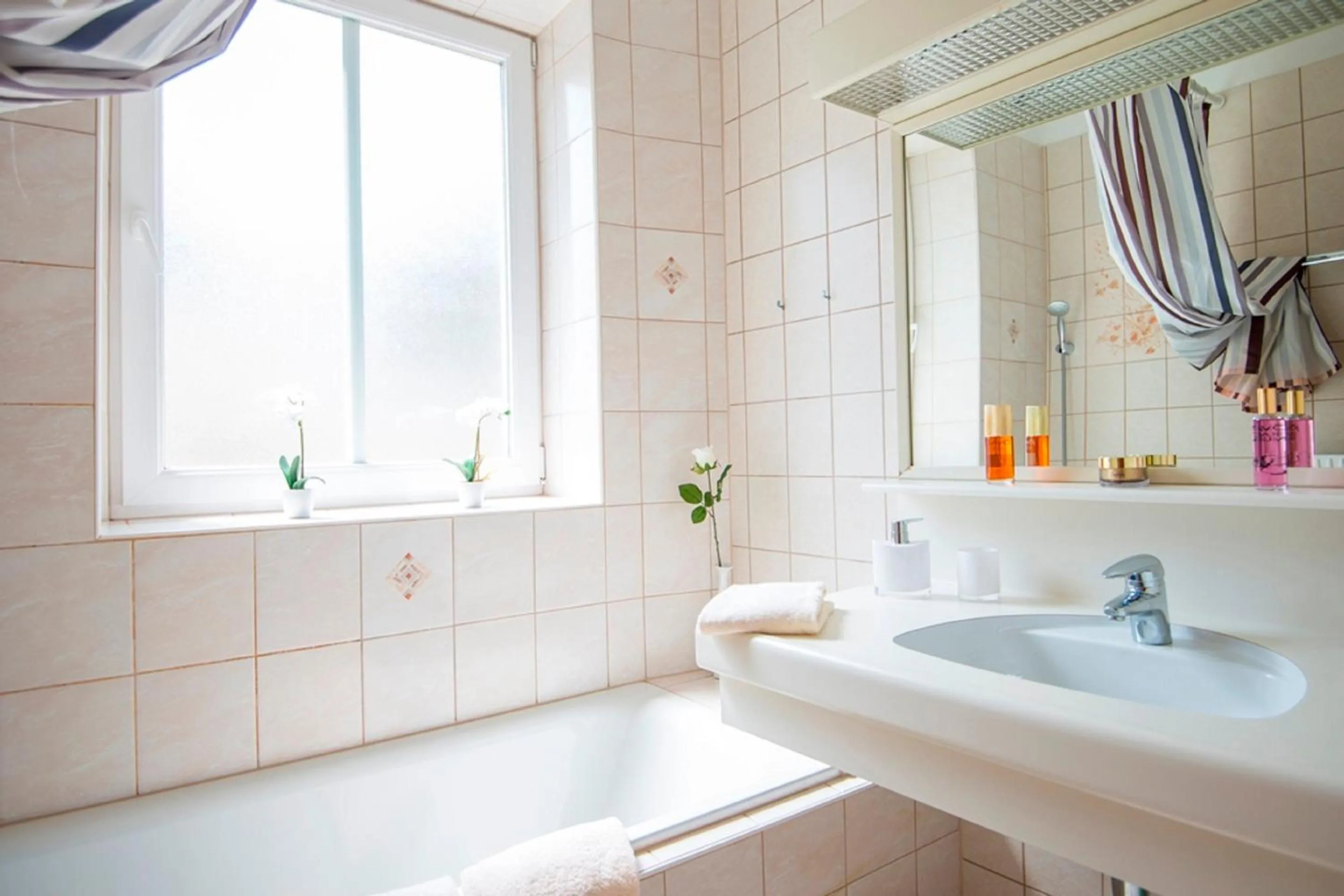 Bathroom in Residenz Lothringen by AlpenTravel