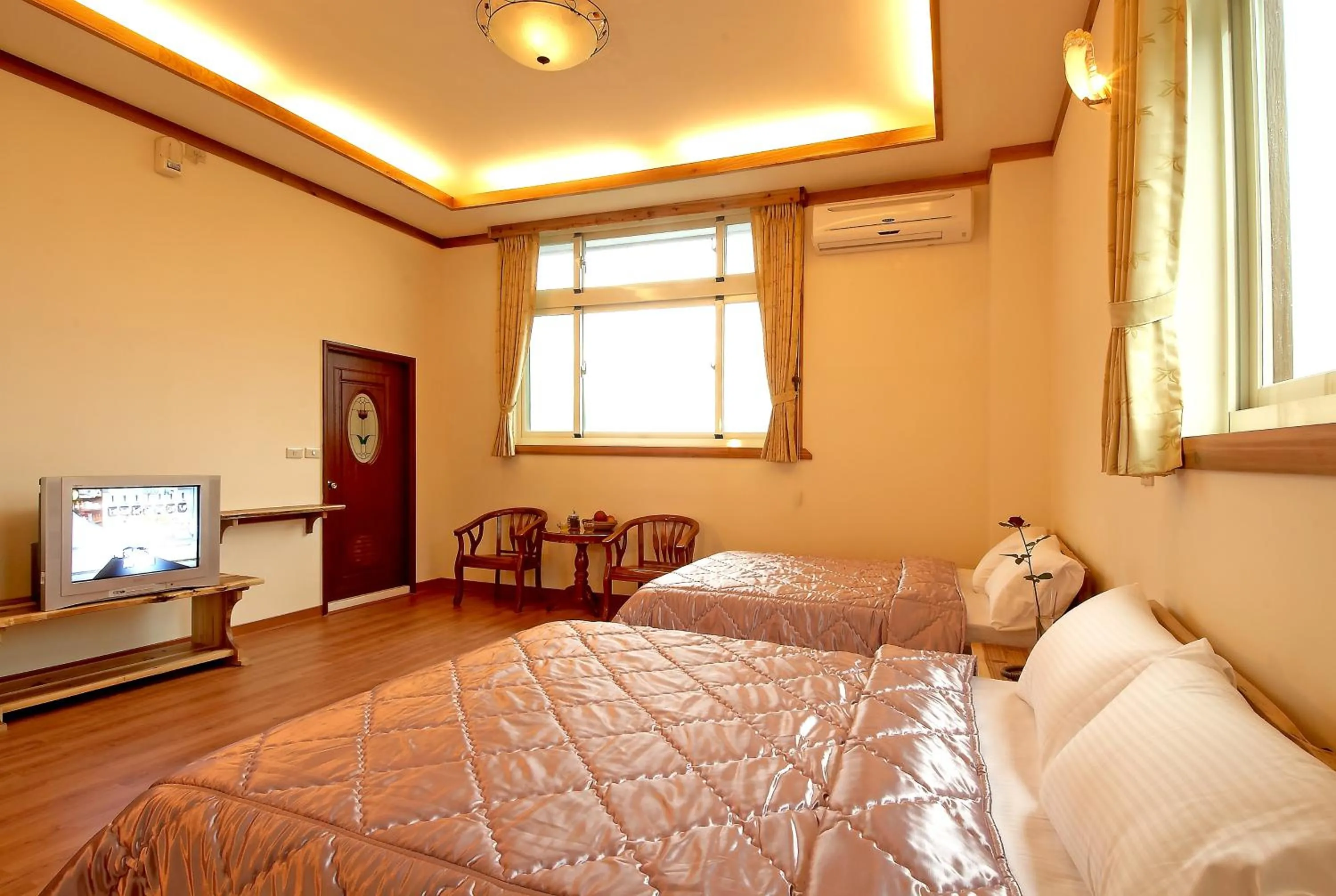 Bed in Bai Shengcun Homestay