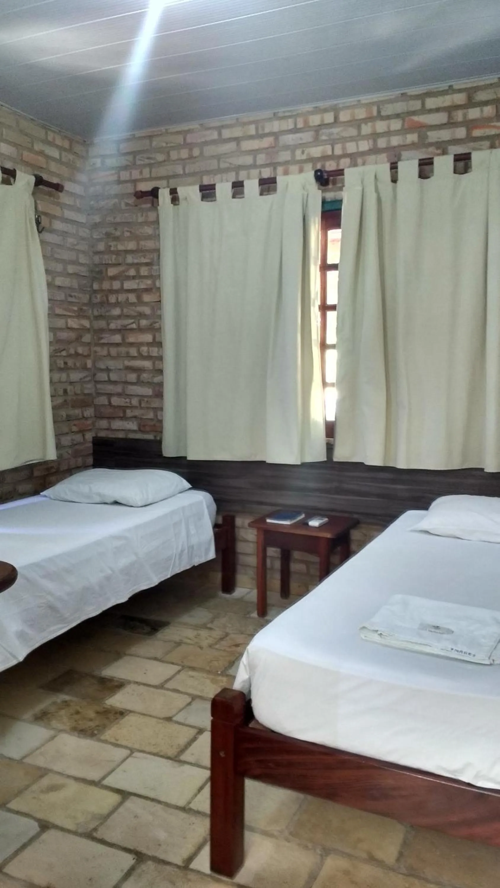 Bed in Pousada 7 Mares