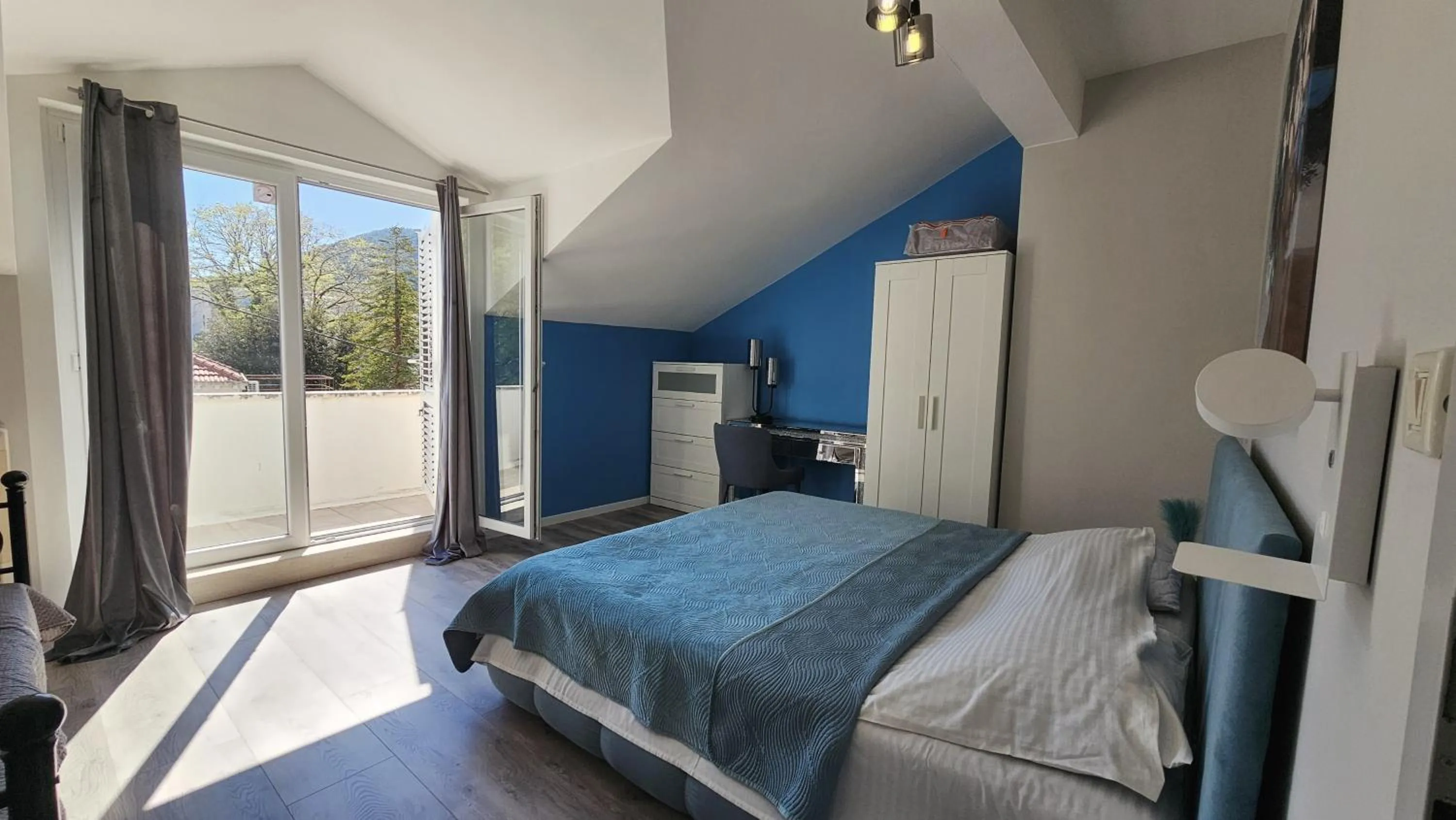 Bed in Adria Apartments and Rooms