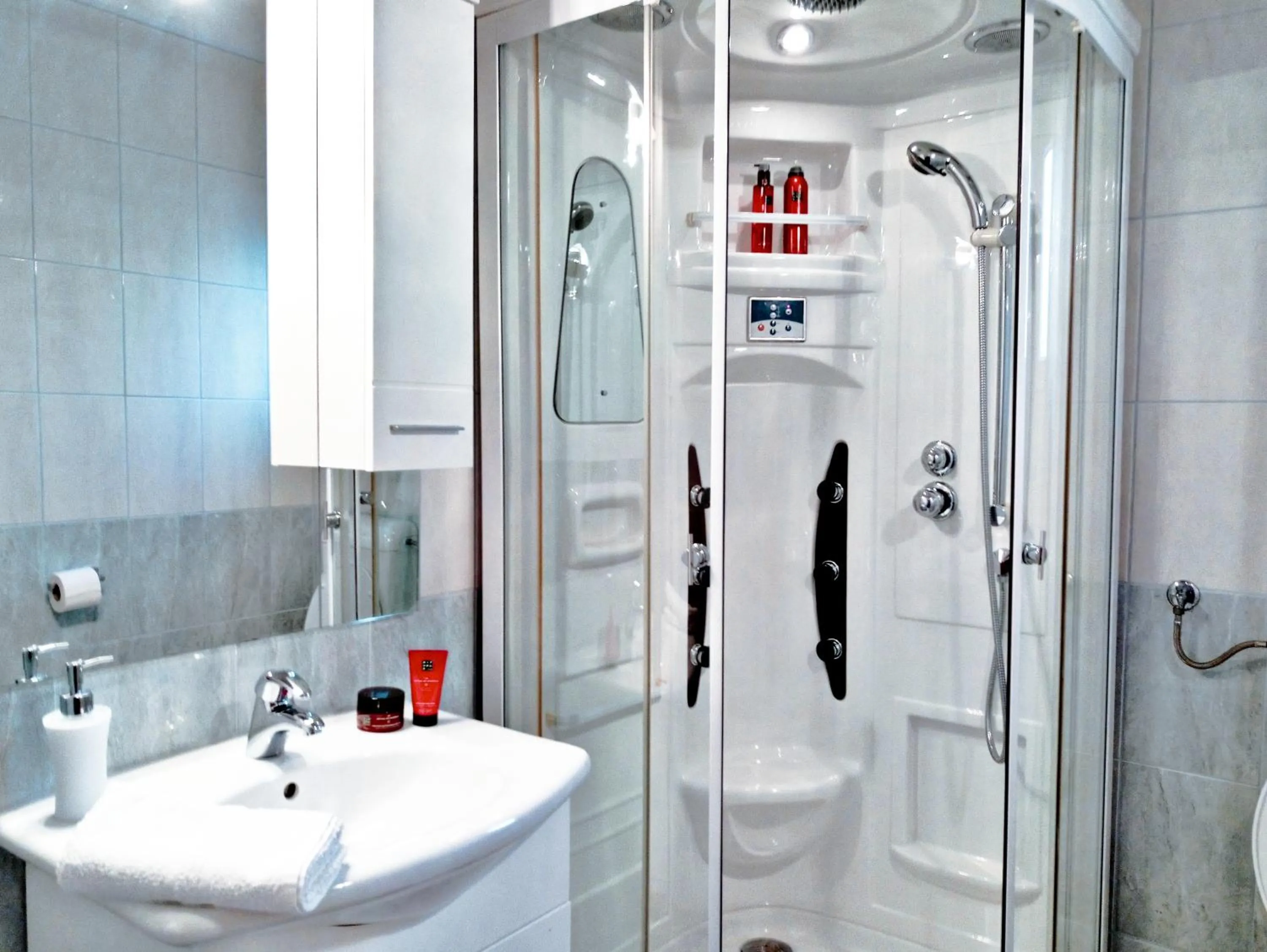 Shower in Adria Apartments and Rooms