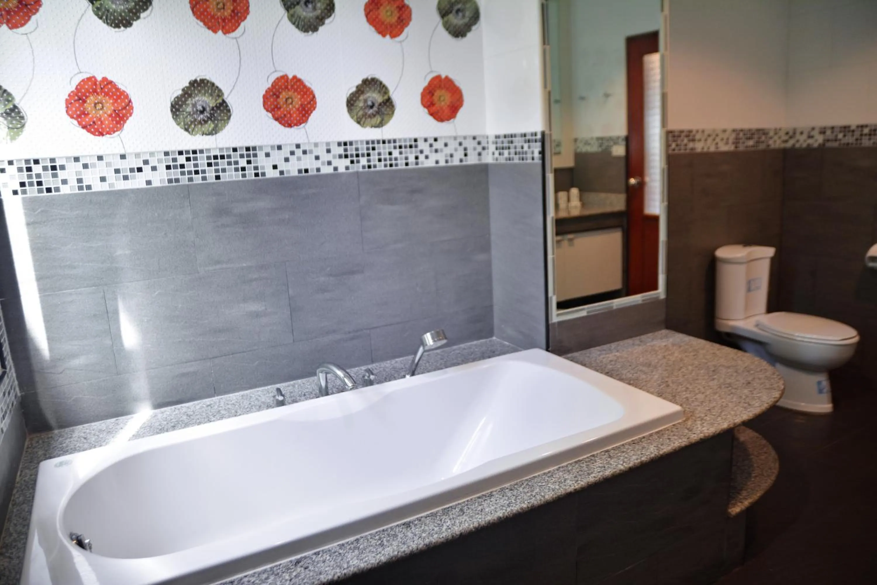 Toilet in White Flower Lanta