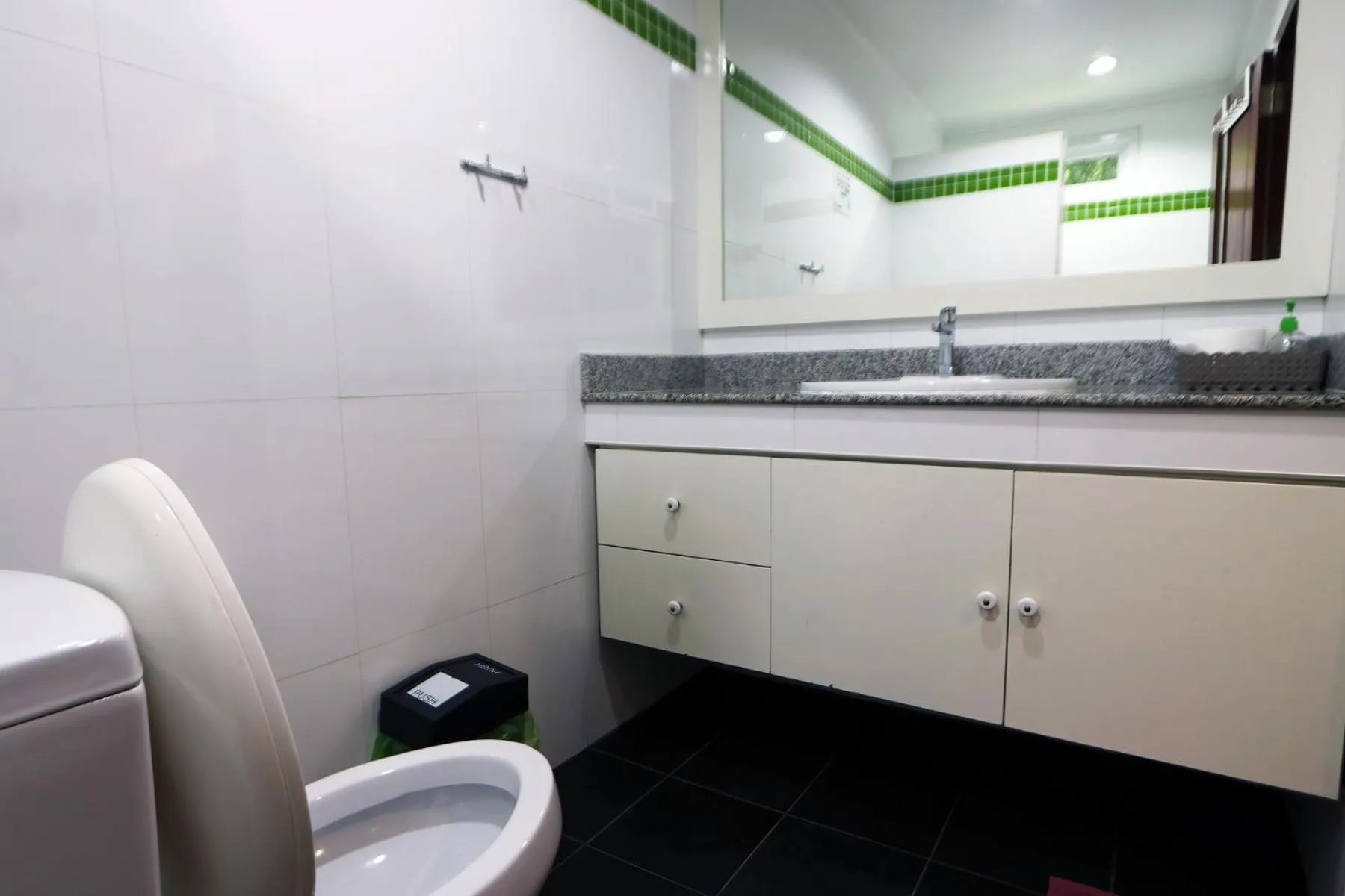 Toilet in White Flower Lanta