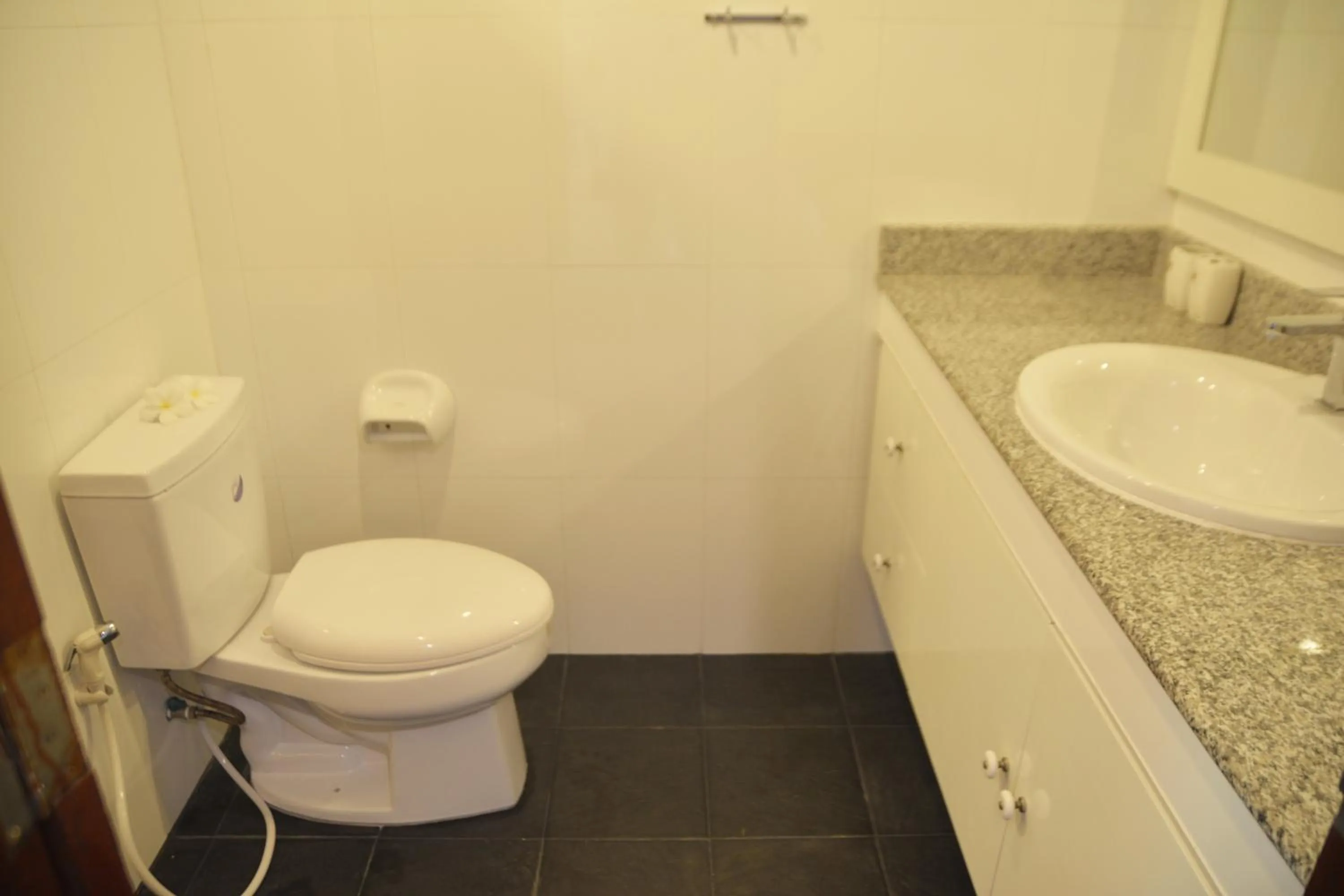 Toilet in White Flower Lanta