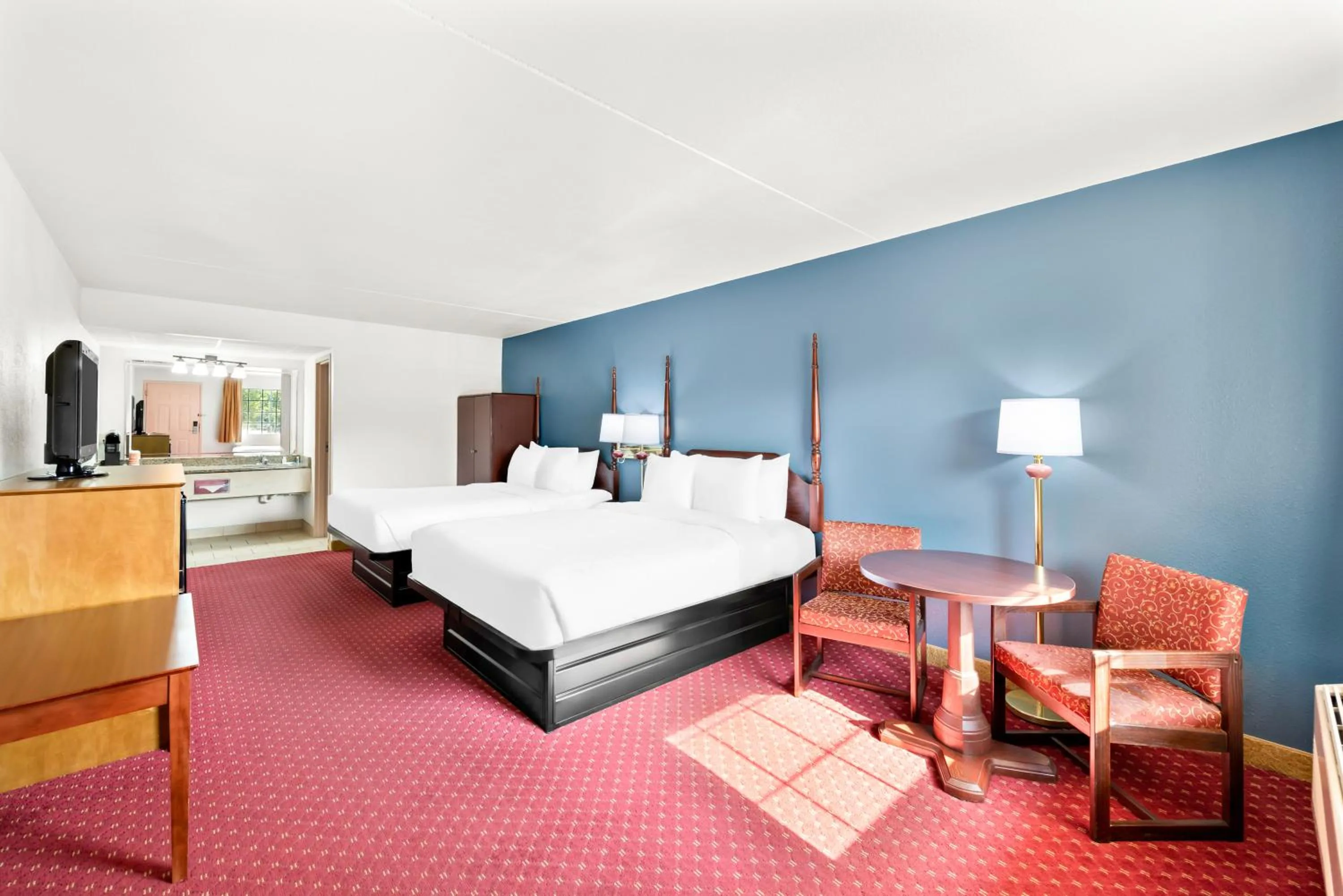 Bed in Clarion Inn Branson