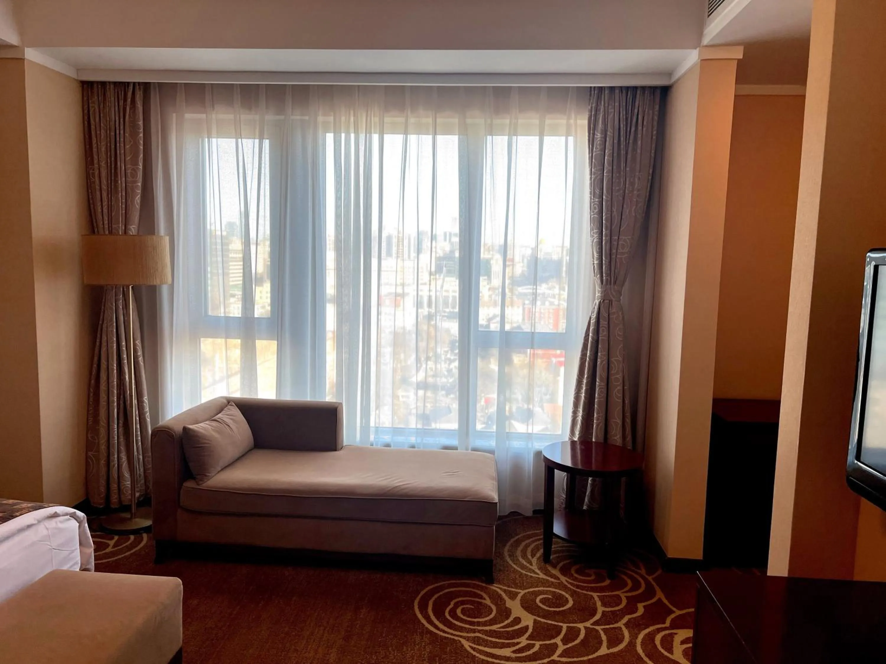 Seating area, Bed in Inner Mongolia Grand Hotel