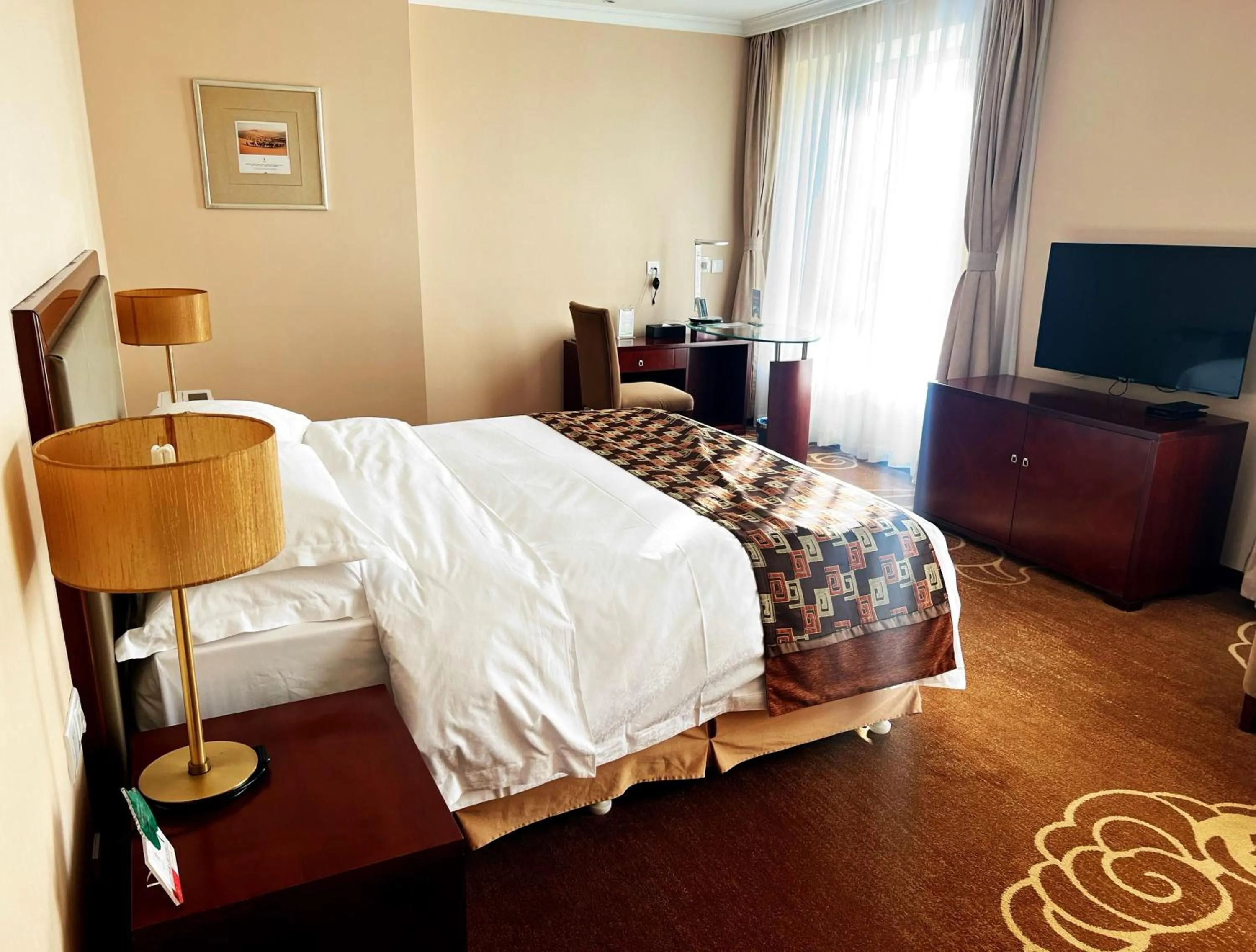 Photo of the whole room, Bed in Inner Mongolia Grand Hotel